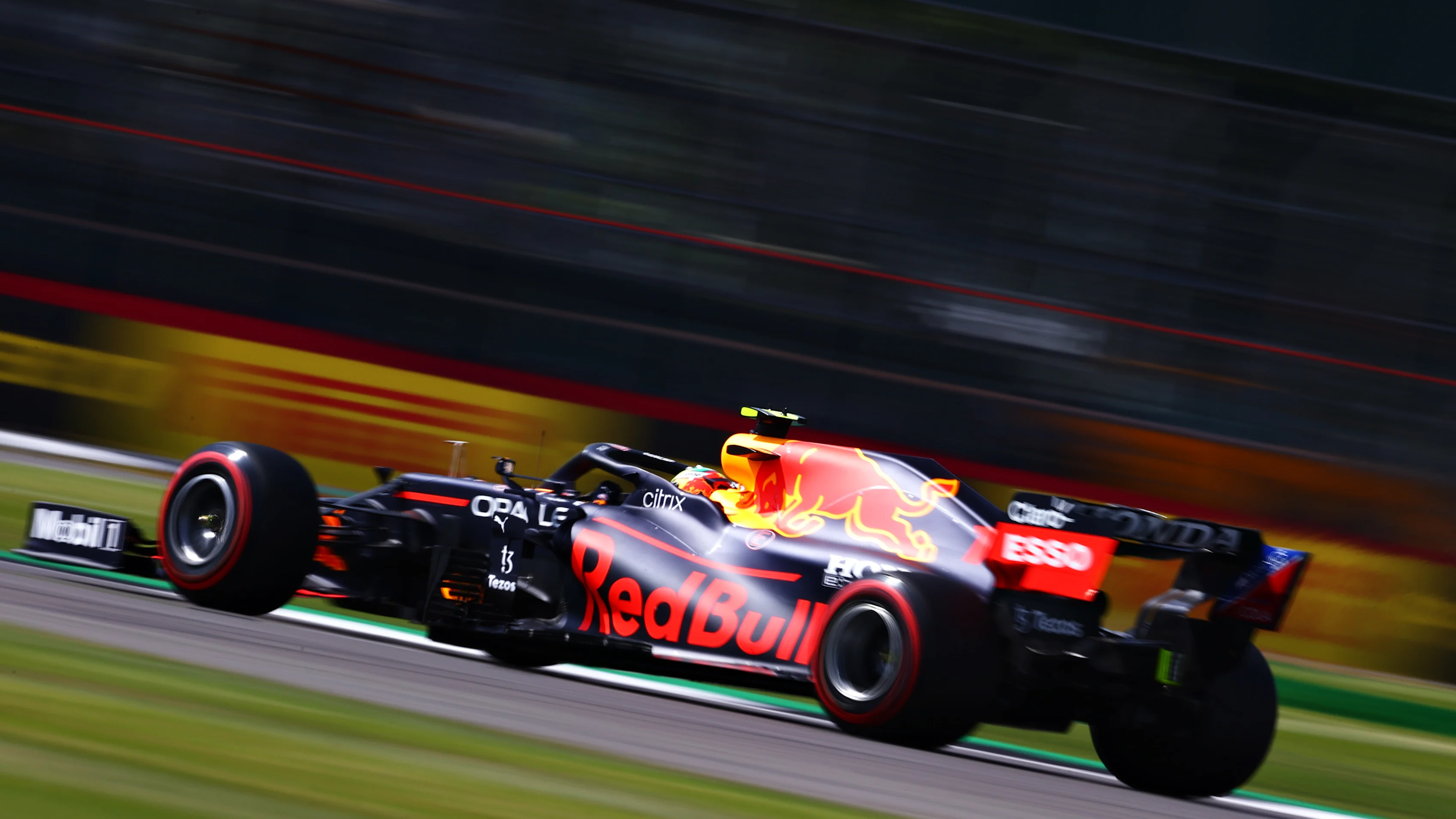 NORTHAMPTON, ENGLAND - JULY 16: Sergio Perez of Mexico driving the (11) Red Bull Racing RB16B Honda
