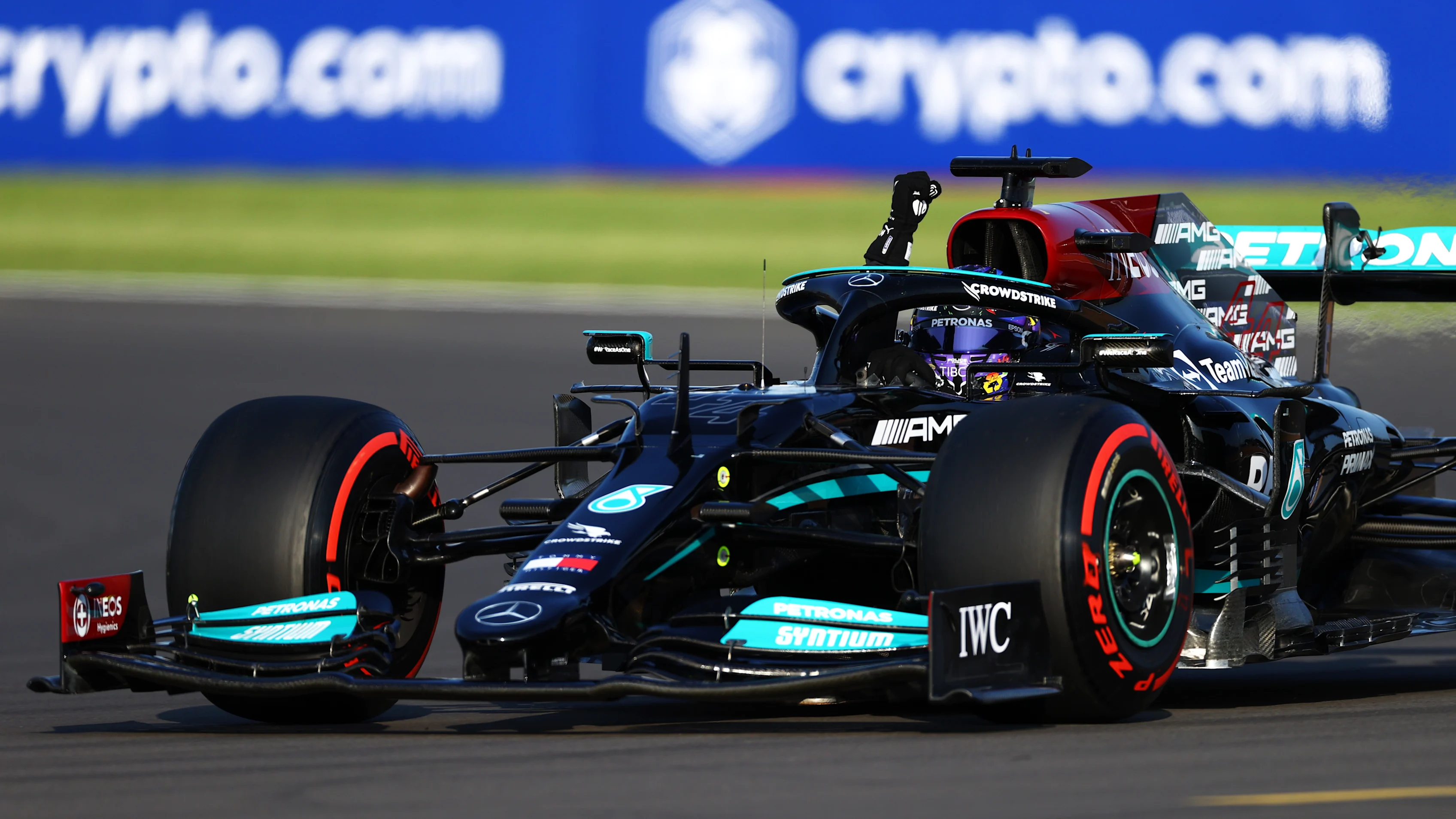 NORTHAMPTON, ENGLAND - JULY 16: Fastest qualifier Lewis Hamilton of Great Britain and Mercedes GP