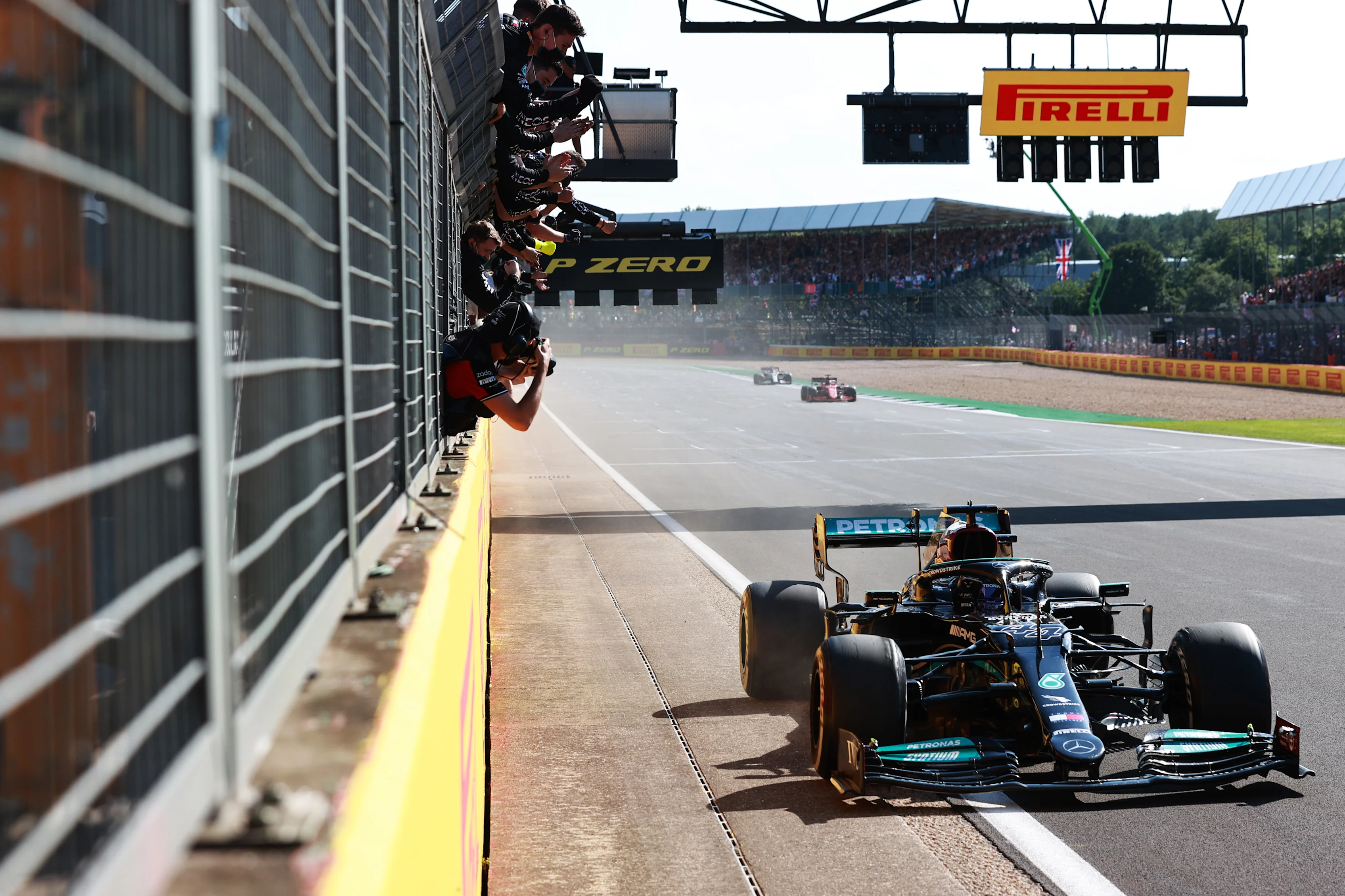 NORTHAMPTON, ENGLAND - JULY 18: Race winner Lewis Hamilton of Great Britain driving the (44)