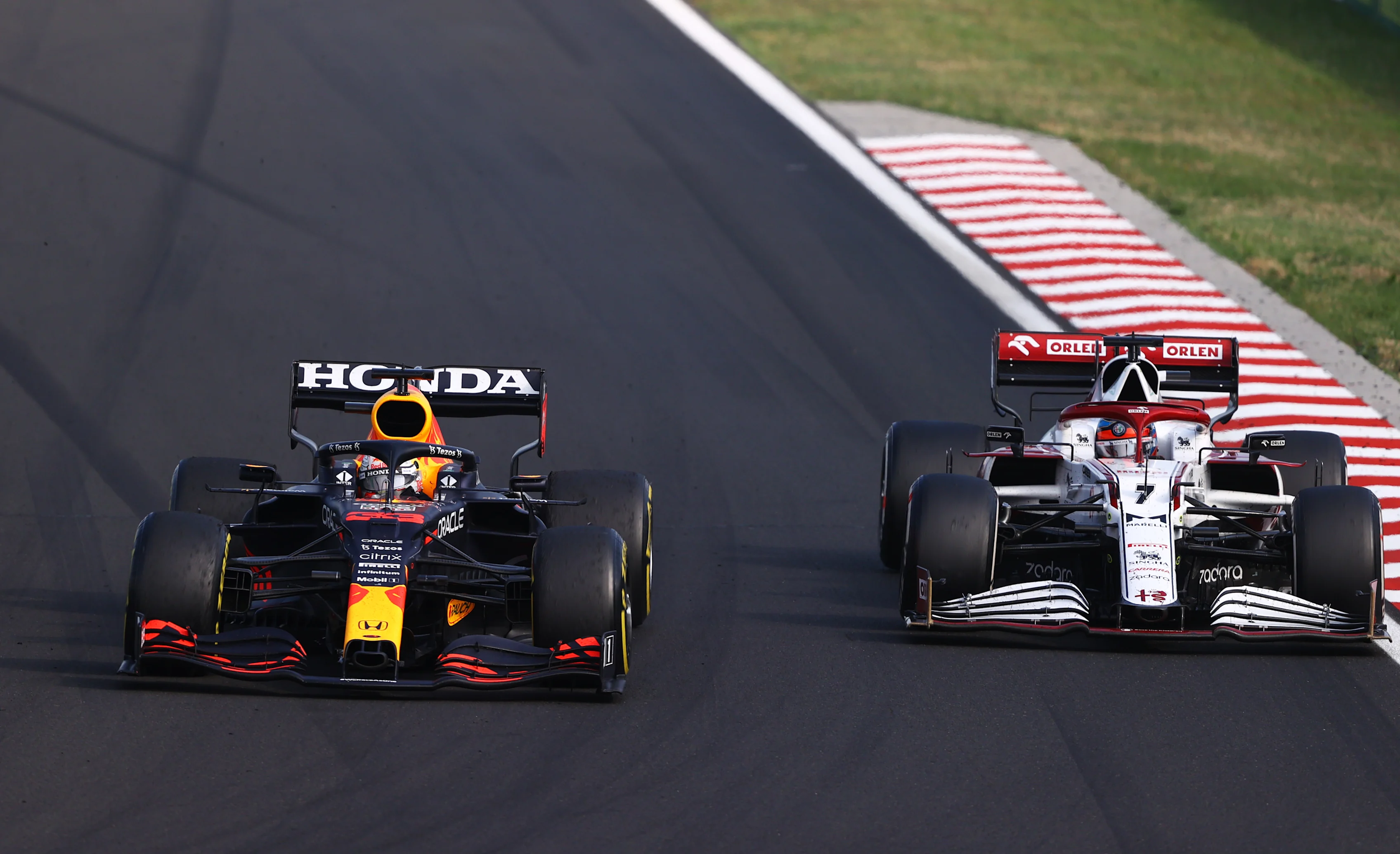 BUDAPEST, HUNGARY - AUGUST 01: Max Verstappen of the Netherlands driving the (33) Red Bull Racing