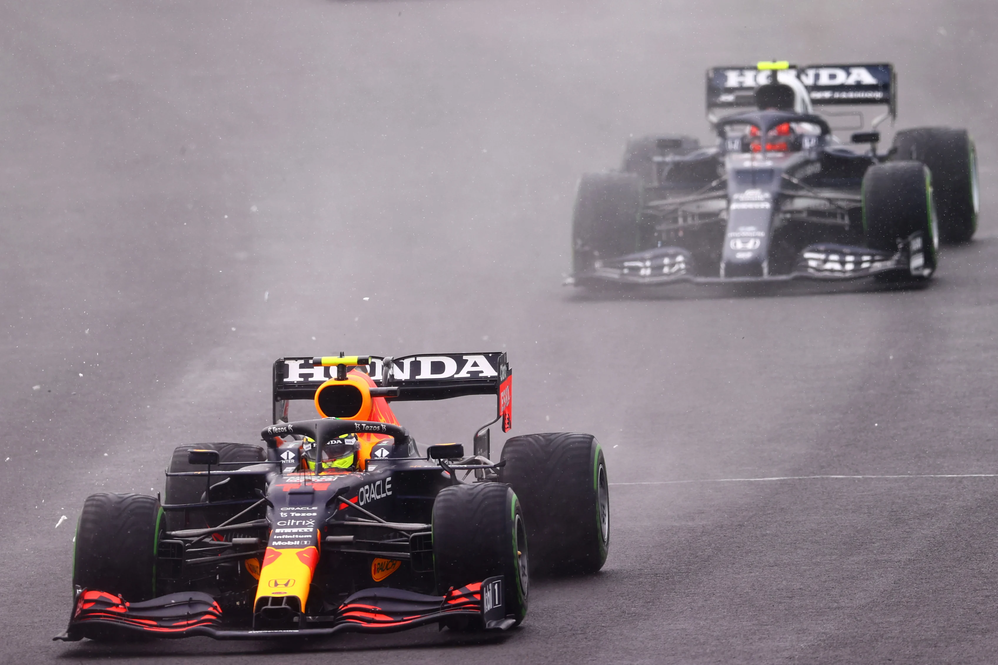 BUDAPEST, HUNGARY - AUGUST 01: Sergio Perez of Mexico driving the (11) Red Bull Racing RB16B Honda