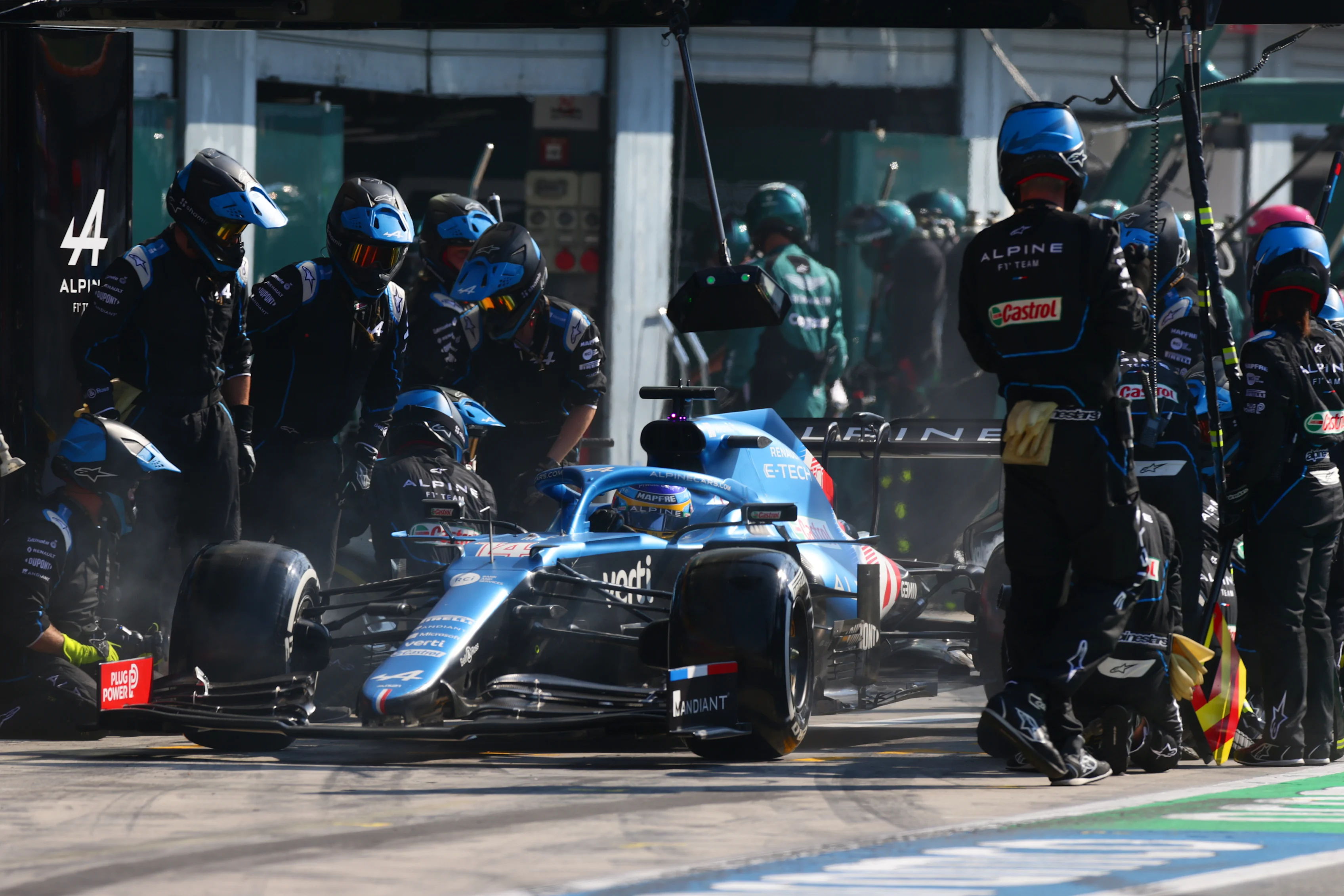 MONZA, ITALY - SEPTEMBER 12: Fernando Alonso of Spain driving the (14) Alpine A521 Renault makes a pitstop during the F1 Grand Prix of Italy at Autodromo di Monza on September 12, 2021 in Monza, Italy. (Photo by Peter Fox/Getty Images)