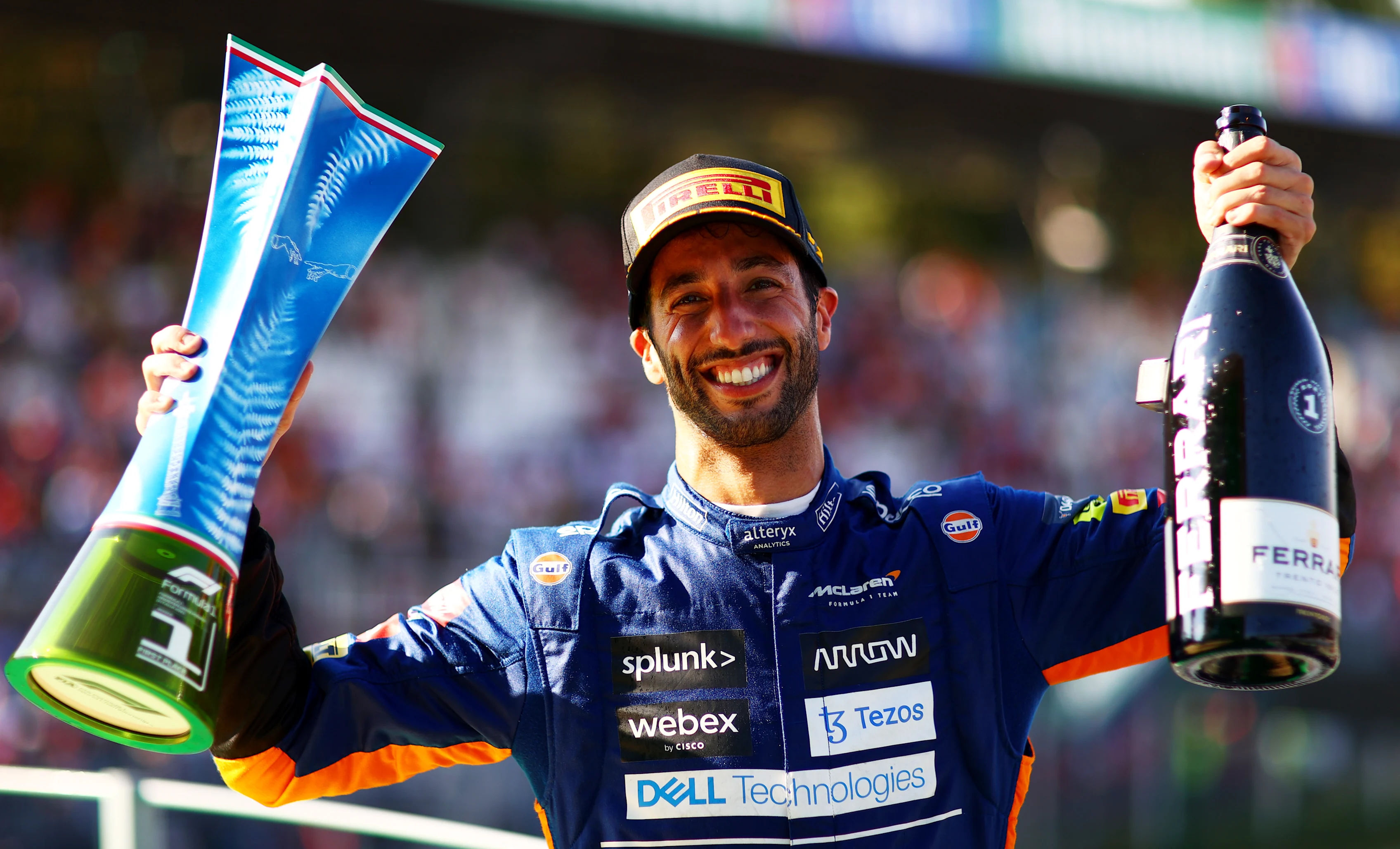 MONZA, ITALY - SEPTEMBER 12: Daniel Ricciardo of Australia and McLaren celebrates on the podium