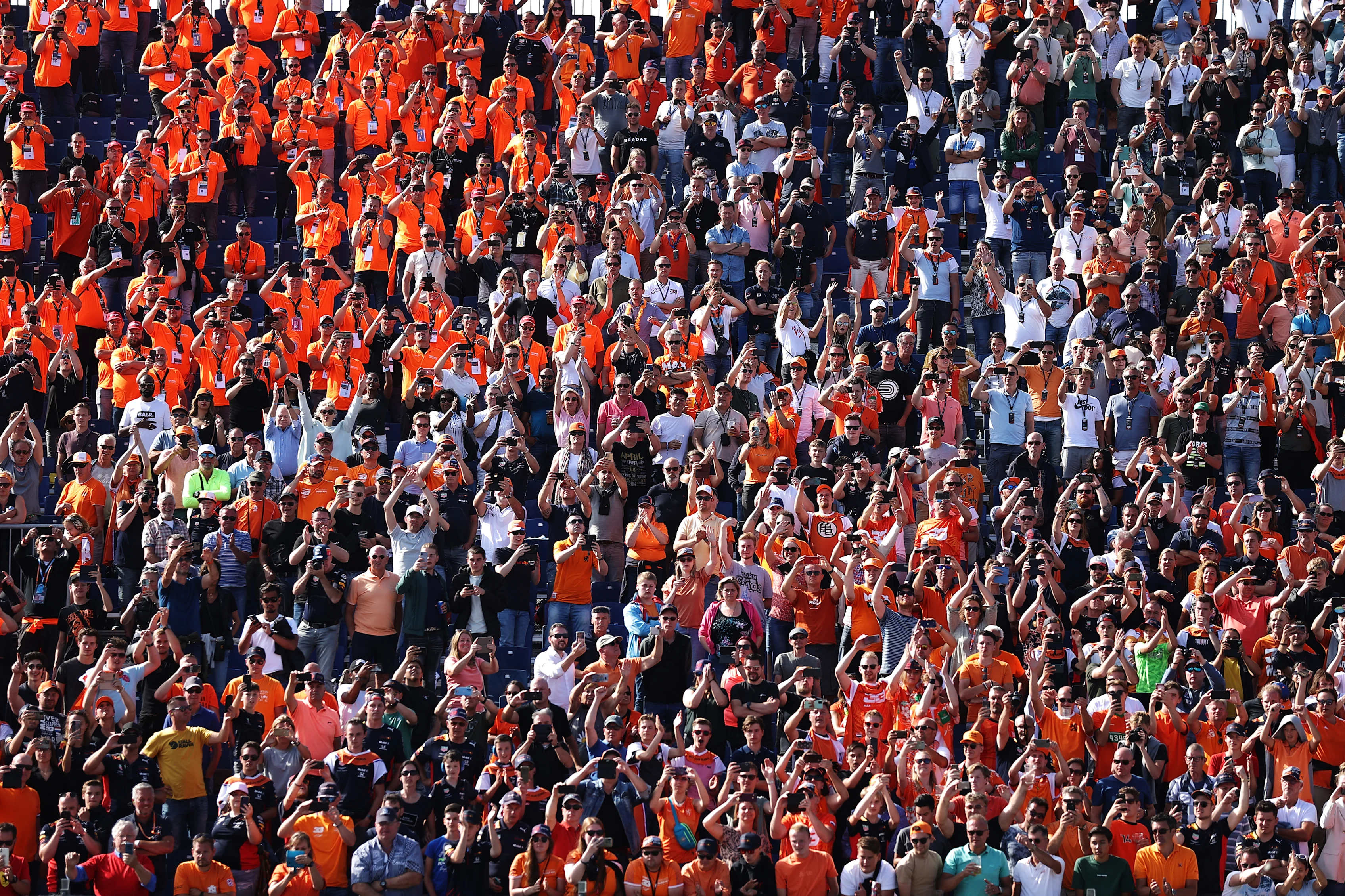 ZANDVOORT, NETHERLANDS - SEPTEMBER 03: Max Verstappen of Netherlands and Red Bull Racing fans watch