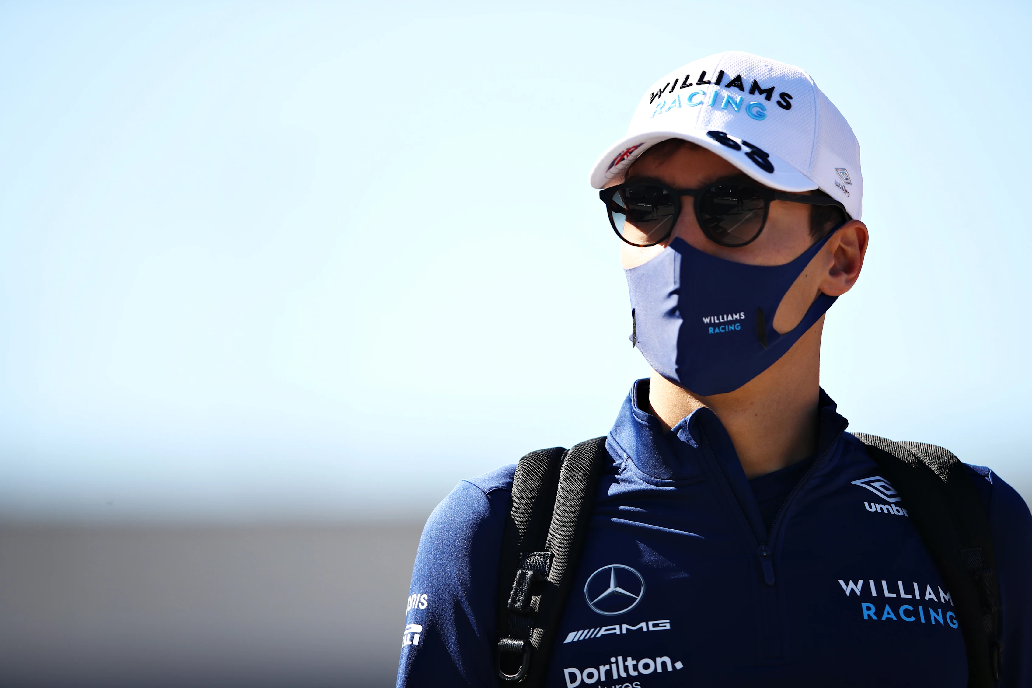 PORTIMAO, PORTUGAL - APRIL 30: George Russell of Great Britain and Williams walks in the Paddock before practice ahead of the F1 Grand Prix of Portugal at Autodromo Internacional Do Algarve on April 30, 2021 in Portimao, Portugal. (Photo by Mark Thompson/Getty Images)