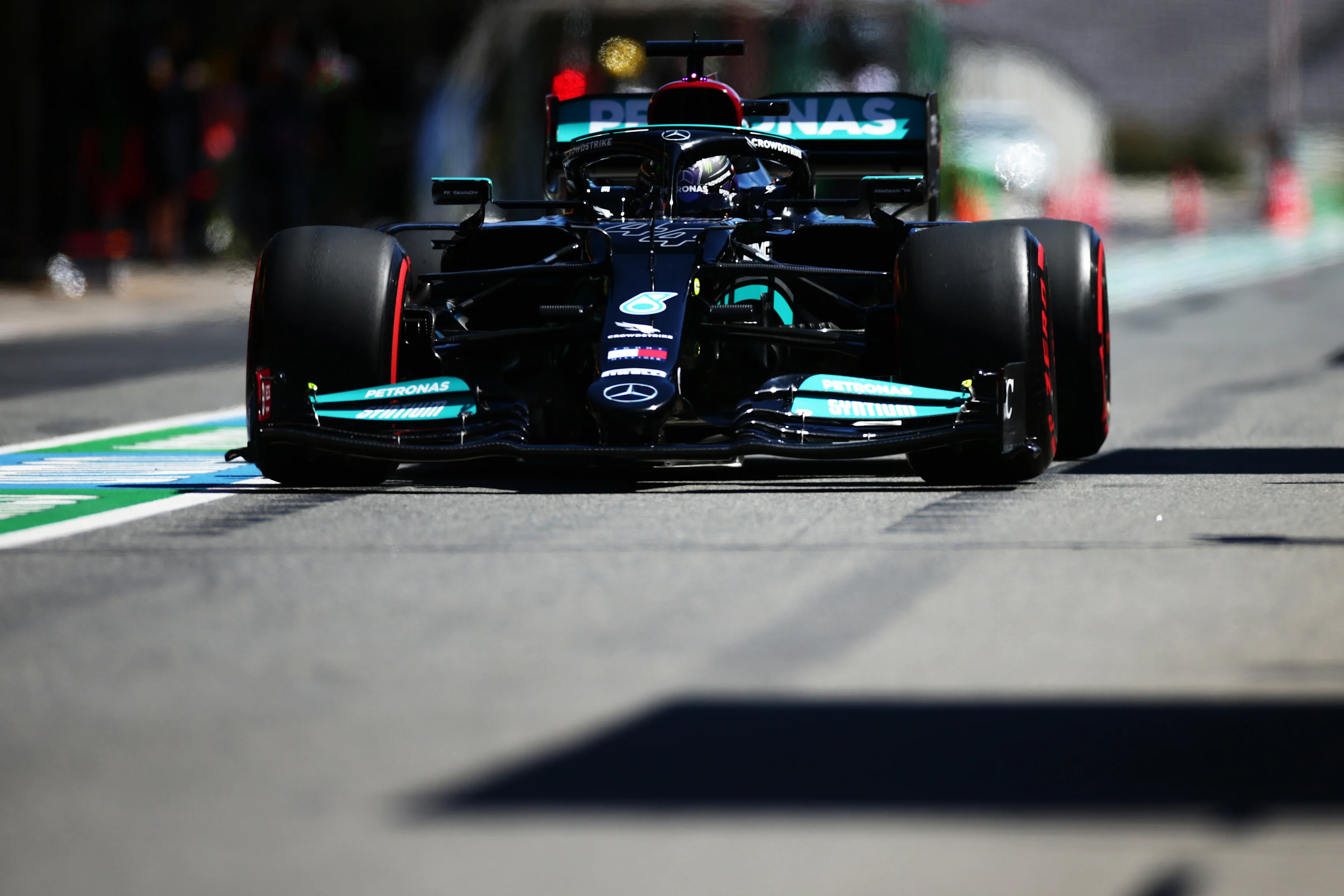 PORTIMAO, PORTUGAL - APRIL 30: Lewis Hamilton of Great Britain driving the (44) Mercedes AMG Petronas F1 Team Mercedes W12 in the Pitlane during practice ahead of the F1 Grand Prix of Portugal at Autodromo Internacional Do Algarve on April 30, 2021 in Portimao, Portugal. (Photo by Peter Fox/Getty Images)