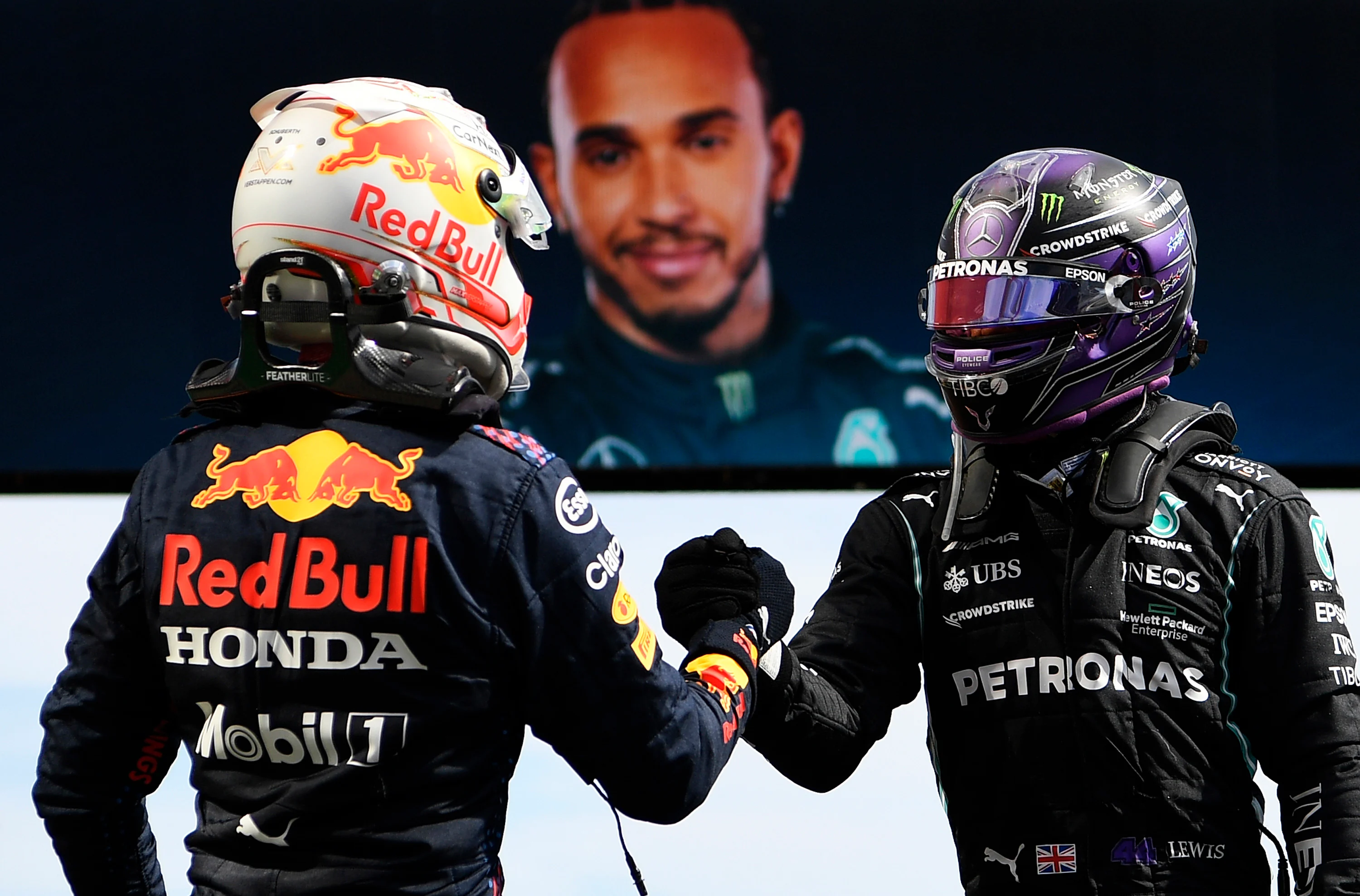 PORTIMAO, PORTUGAL - MAY 02: Race winner Lewis Hamilton of Great Britain and Mercedes GP interacts with second placed Max Verstappen of Netherlands and Red Bull Racing in parc ferme after the F1 Grand Prix of Portugal at Autodromo Internacional Do Algarve on May 02, 2021 in Portimao, Portugal. (Photo by Gabriel Bouys - Pool/Getty Images)