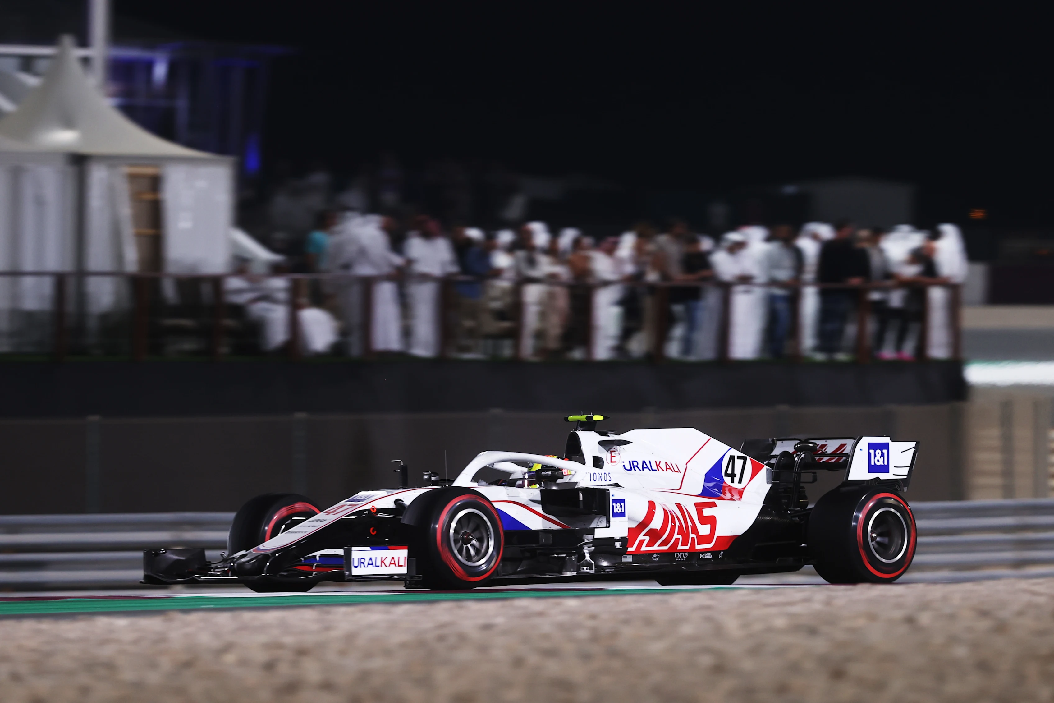 DOHA, QATAR - NOVEMBER 21: Mick Schumacher of Germany driving the (47) Haas F1 Team VF-21 Ferrari during the F1 Grand Prix of Qatar at Losail International Circuit on November 21, 2021 in Doha, Qatar. (Photo by Lars Baron/Getty Images)