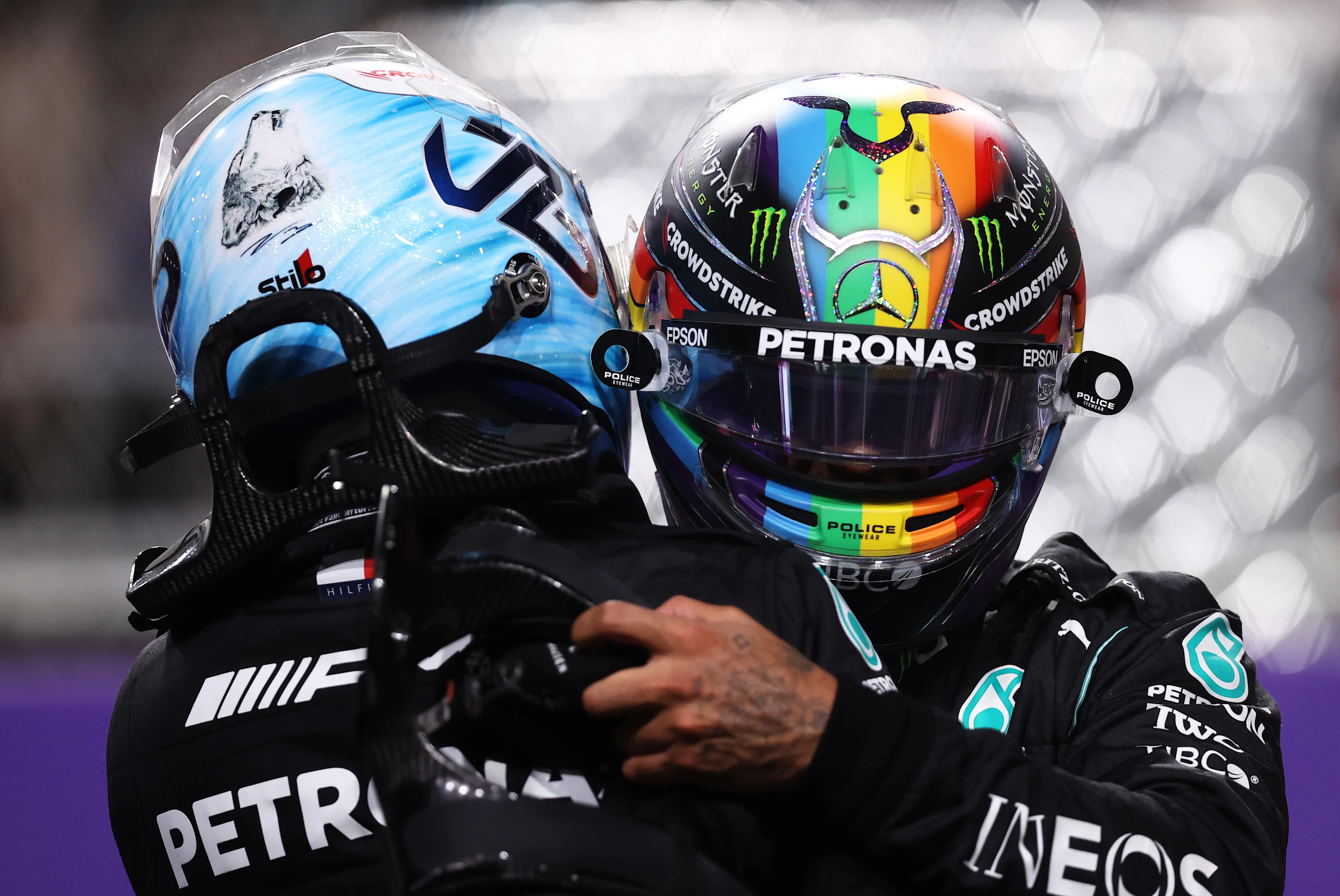 JEDDAH, SAUDI ARABIA - DECEMBER 04: Pole position qualifier Lewis Hamilton of Great Britain and Mercedes GP and second place qualifier Valtteri Bottas of Finland and Mercedes GP celebrate in parc ferme during qualifying ahead of the F1 Grand Prix of Saudi Arabia at Jeddah Corniche Circuit on December 04, 2021 in Jeddah, Saudi Arabia. (Photo by Lars Baron/Getty Images)