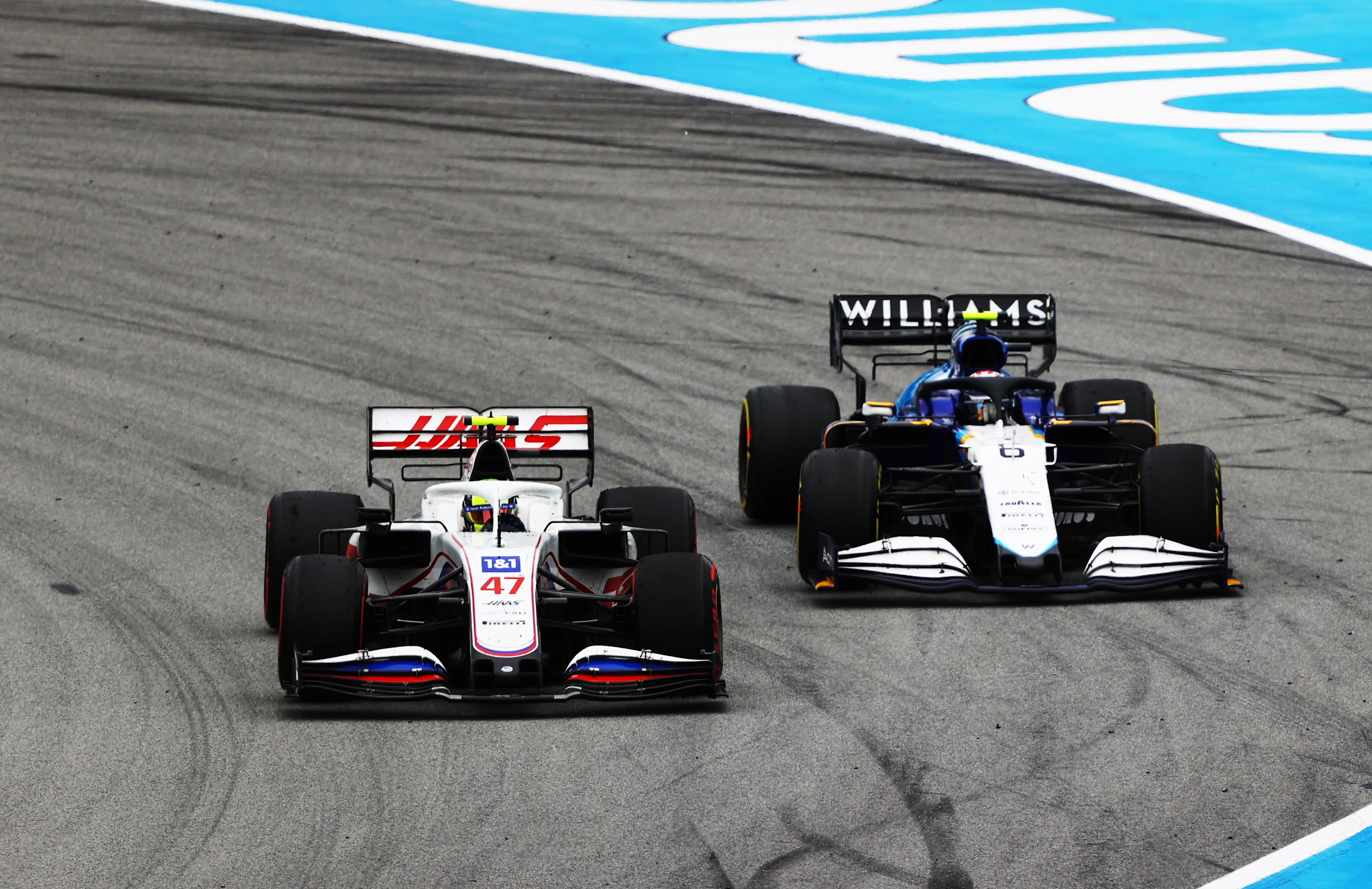 BARCELONA, SPAIN - MAY 09: Mick Schumacher of Germany driving the (47) Haas F1 Team VF-21 Ferrari leads Nicholas Latifi of Canada driving the (6) Williams Racing FW43B Mercedes on track during the F1 Grand Prix of Spain at Circuit de Barcelona-Catalunya on May 09, 2021 in Barcelona, Spain. (Photo by Bryn Lennon/Getty Images)