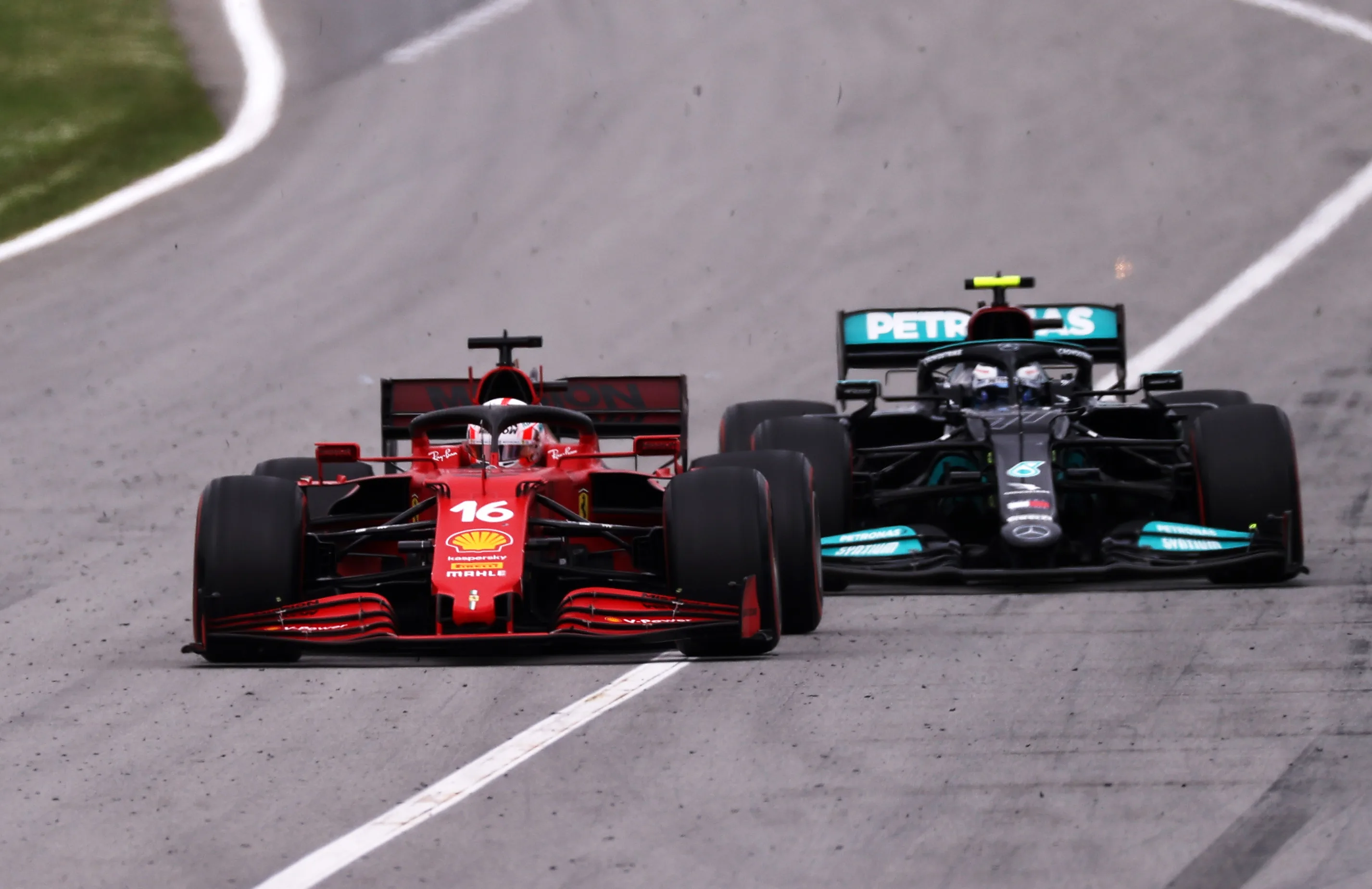 BARCELONA, SPAIN - MAY 09: Charles Leclerc of Monaco driving the (16) Scuderia Ferrari SF21 leads