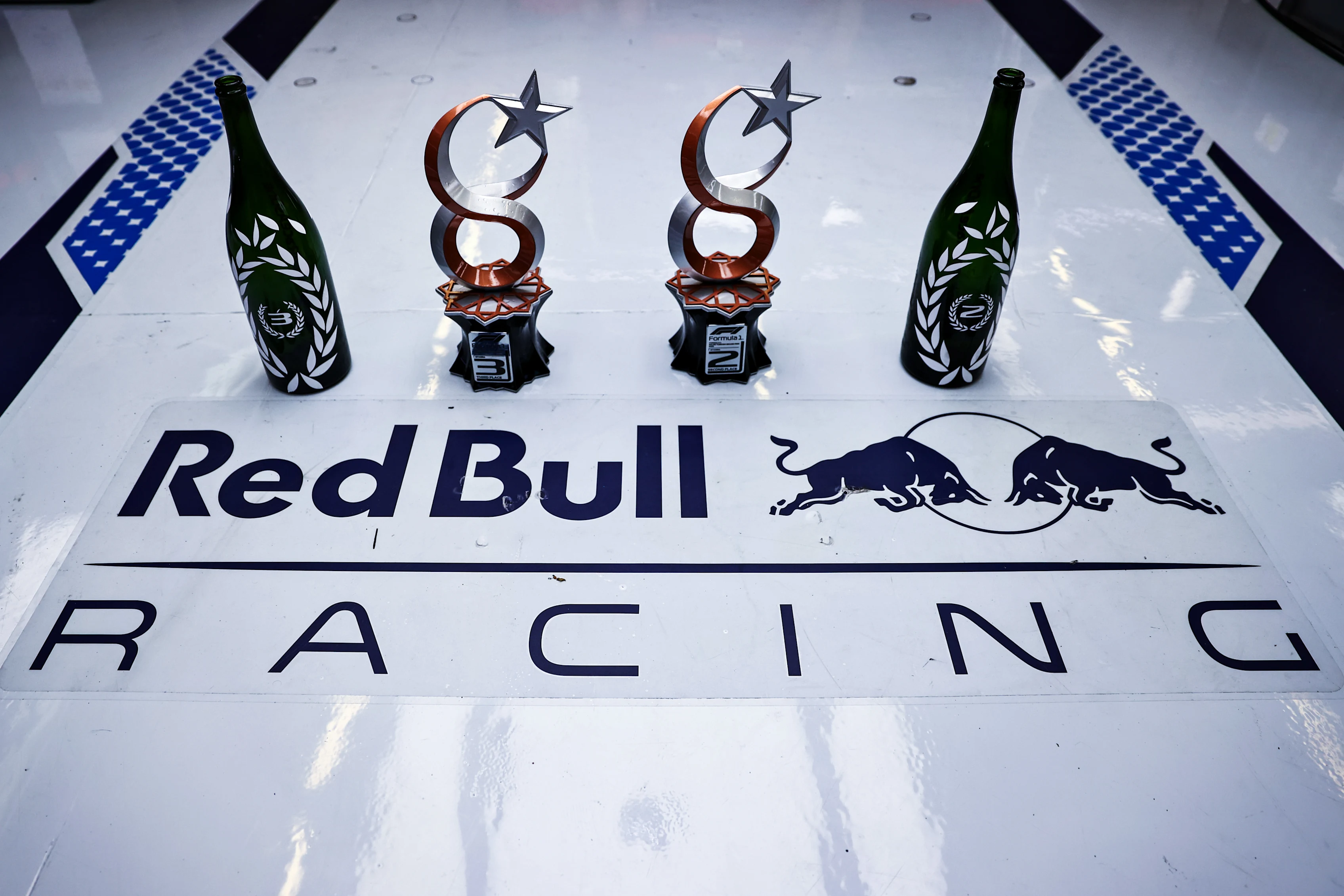 ISTANBUL, TURKEY - OCTOBER 10: The second and third place trophies of Max Verstappen of Netherlands