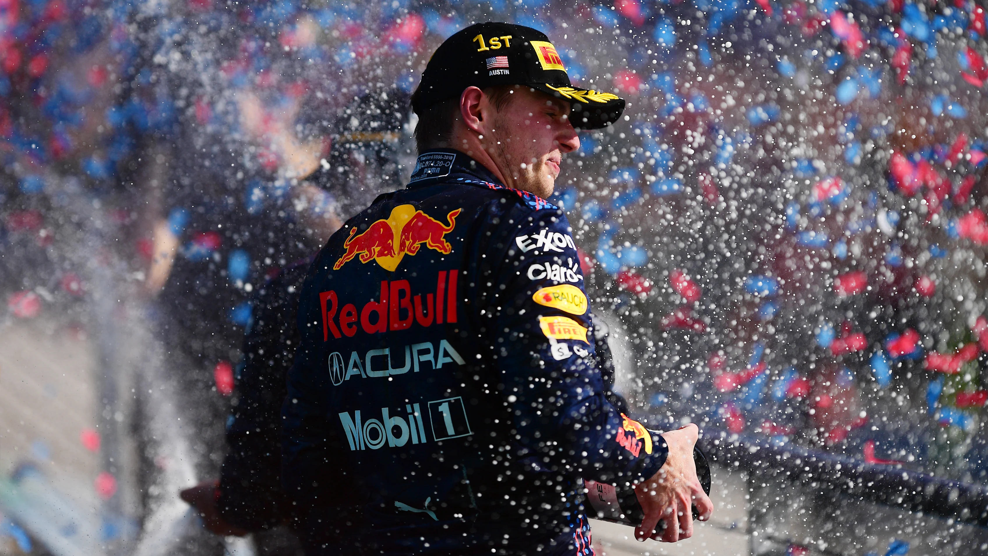 AUSTIN, TEXAS - OCTOBER 24: Race winner Max Verstappen of Netherlands and Red Bull Racing celebrates on the podium during the F1 Grand Prix of USA at Circuit of The Americas on October 24, 2021 in Austin, Texas. (Photo by Mario Renzi - Formula 1/Formula 1 via Getty Images)