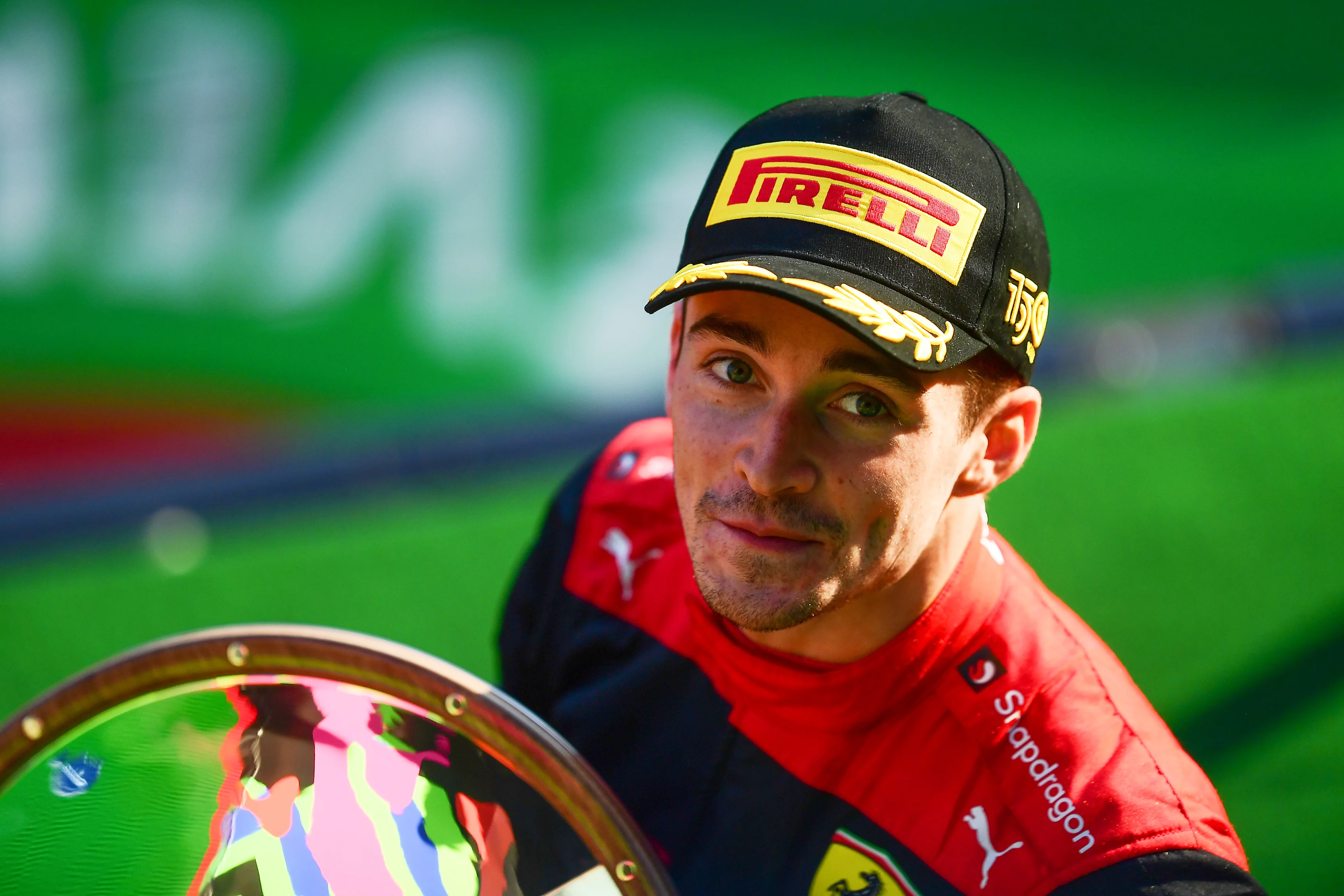 MELBOURNE, AUSTRALIA - APRIL 10: Race winner Charles Leclerc of Monaco and Ferrari celebrates on the podium during the F1 Grand Prix of Australia at Melbourne Grand Prix Circuit on April 10, 2022 in Melbourne, Australia. (Photo by Mario Renzi - Formula 1/Formula 1 via Getty Images)