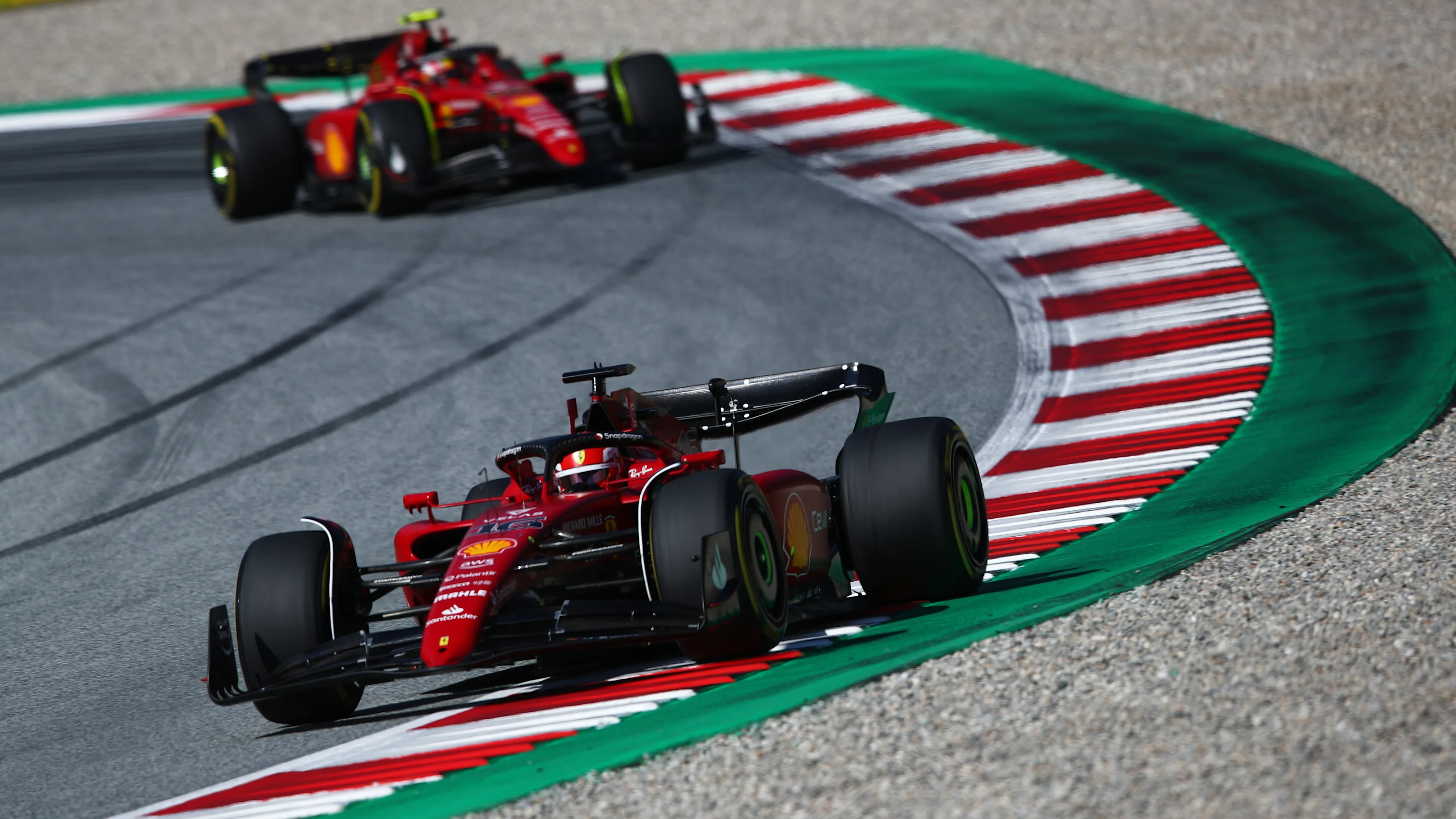 SPIELBERG, AUSTRIA - JULY 09: Charles Leclerc of Monaco driving (16) the Ferrari F1-75 leads Carlos