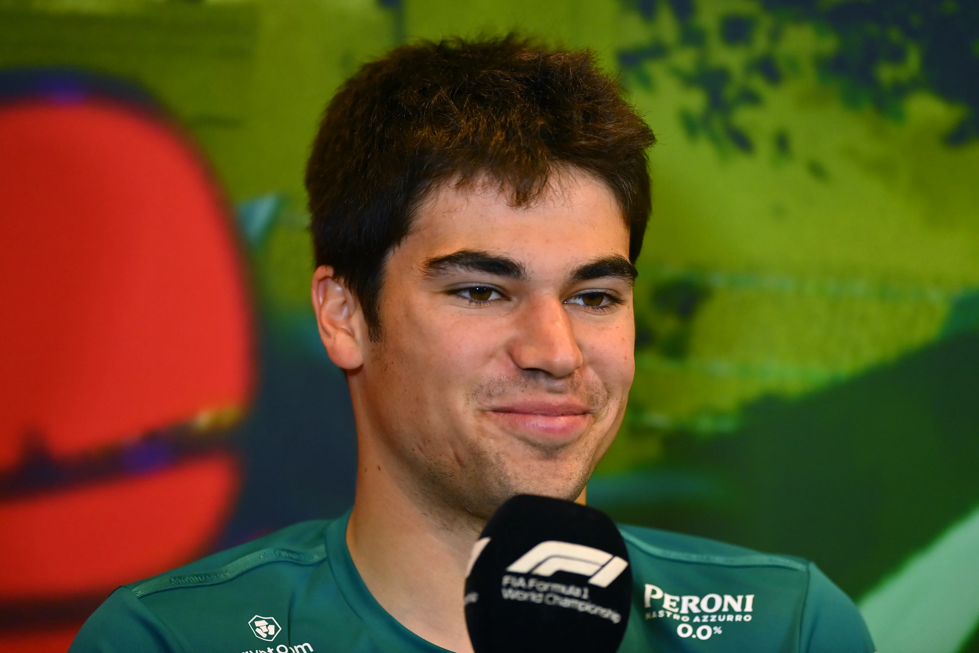 BAKU, AZERBAIJAN - JUNE 10: Lance Stroll of Canada driving the (18) Aston Martin AMR22 Mercedes talks in the Drivers Press Conference prior to practice ahead of the F1 Grand Prix of Azerbaijan at Baku City Circuit on June 10, 2022 in Baku, Azerbaijan. (Photo by Dan Mullan/Getty Images)