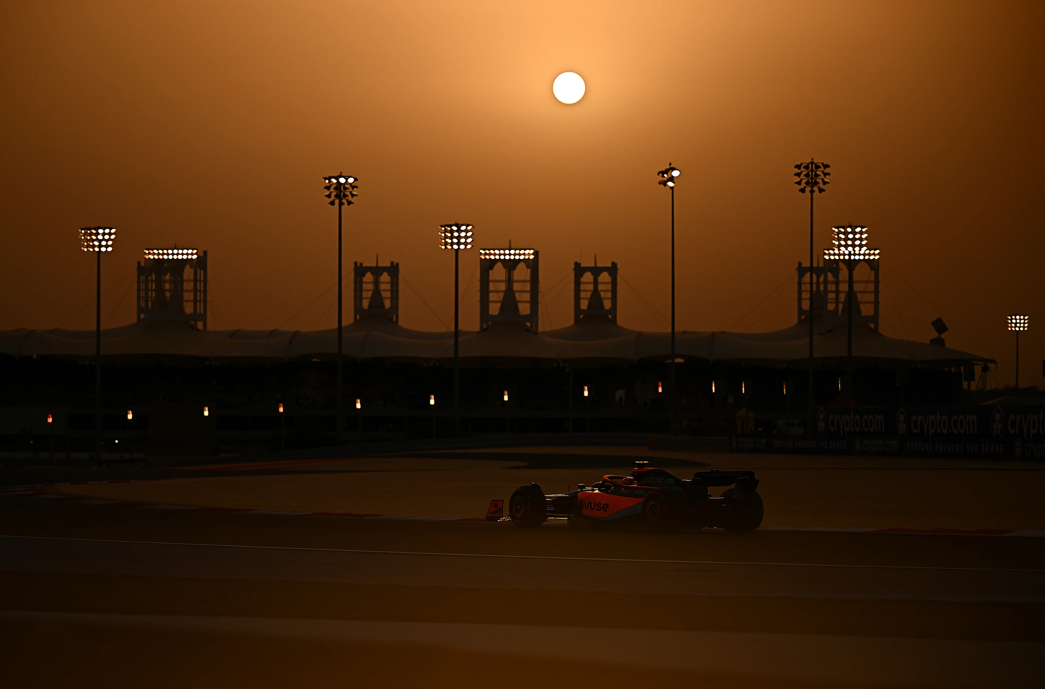 BAHRAIN, BAHRAIN - MARCH 20: Daniel Ricciardo of Australia driving the (3) McLaren MCL36 Mercedes on his way to the grid before the F1 Grand Prix of Bahrain at Bahrain International Circuit on March 20, 2022 in Bahrain, Bahrain. (Photo by Clive Mason/Getty Images)