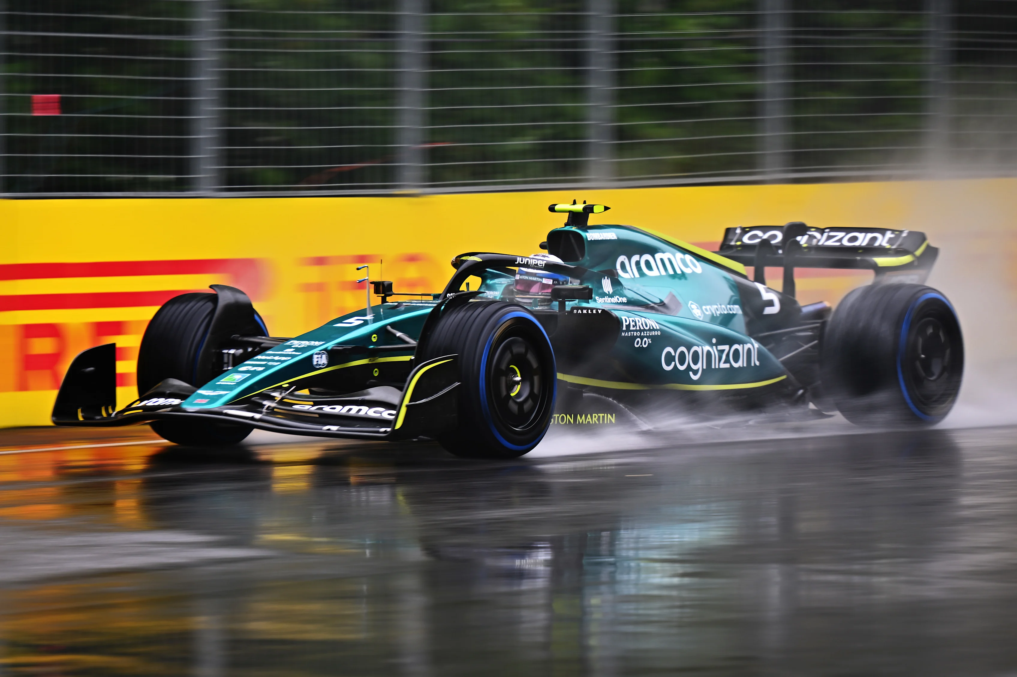MONTREAL, QUEBEC - JUNE 18: Sebastian Vettel of Germany driving the (5) Aston Martin AMR22 Mercedes