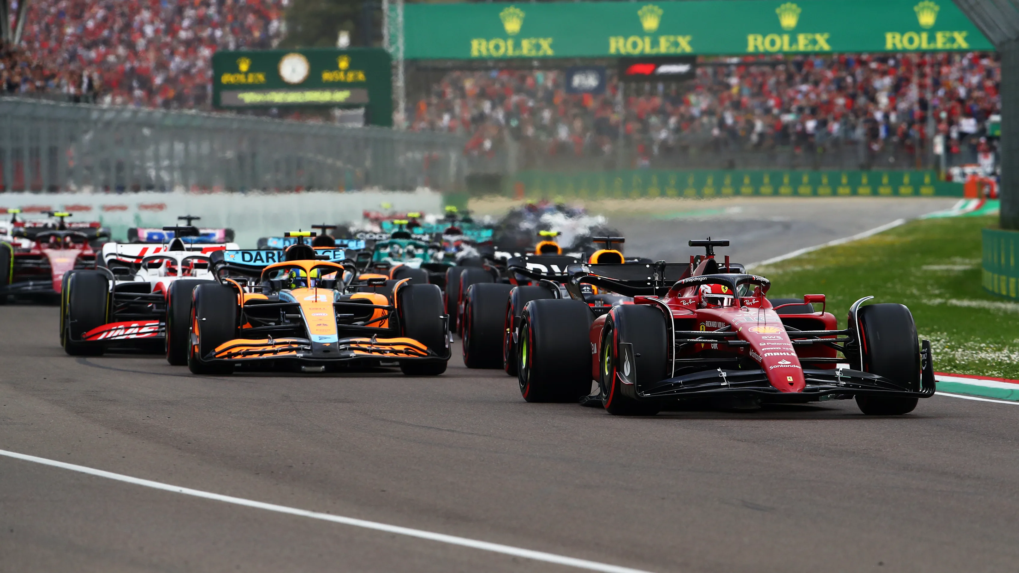 IMOLA, ITALY - APRIL 23: Charles Leclerc of Monaco driving (16) the Ferrari F1-75 leads the field