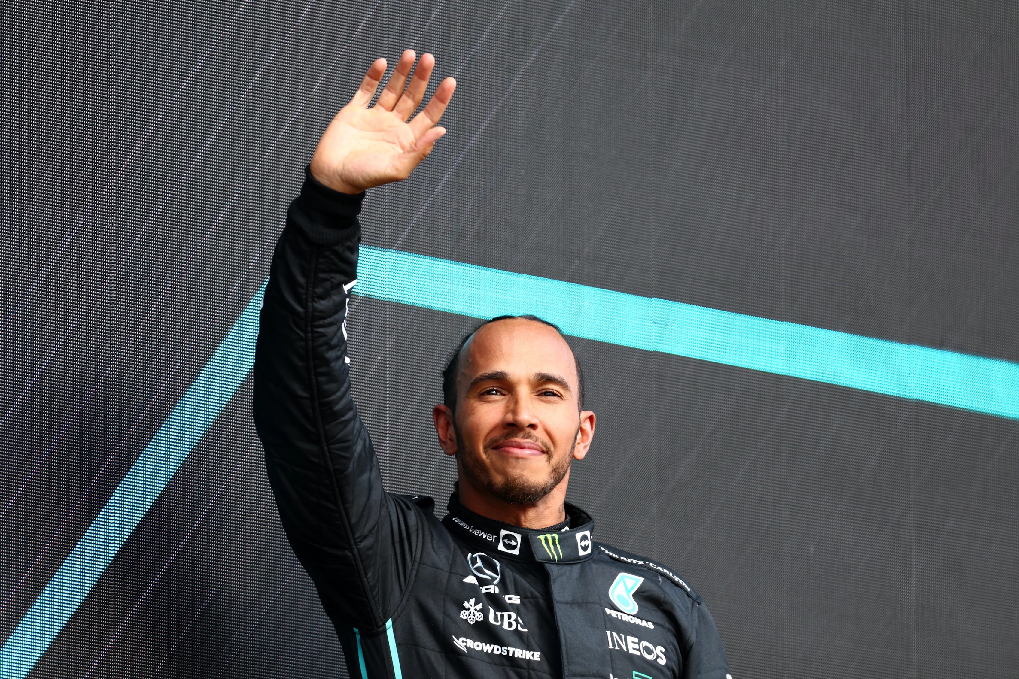 NORTHAMPTON, ENGLAND - JULY 03: Third placed Lewis Hamilton of Great Britain and Mercedes