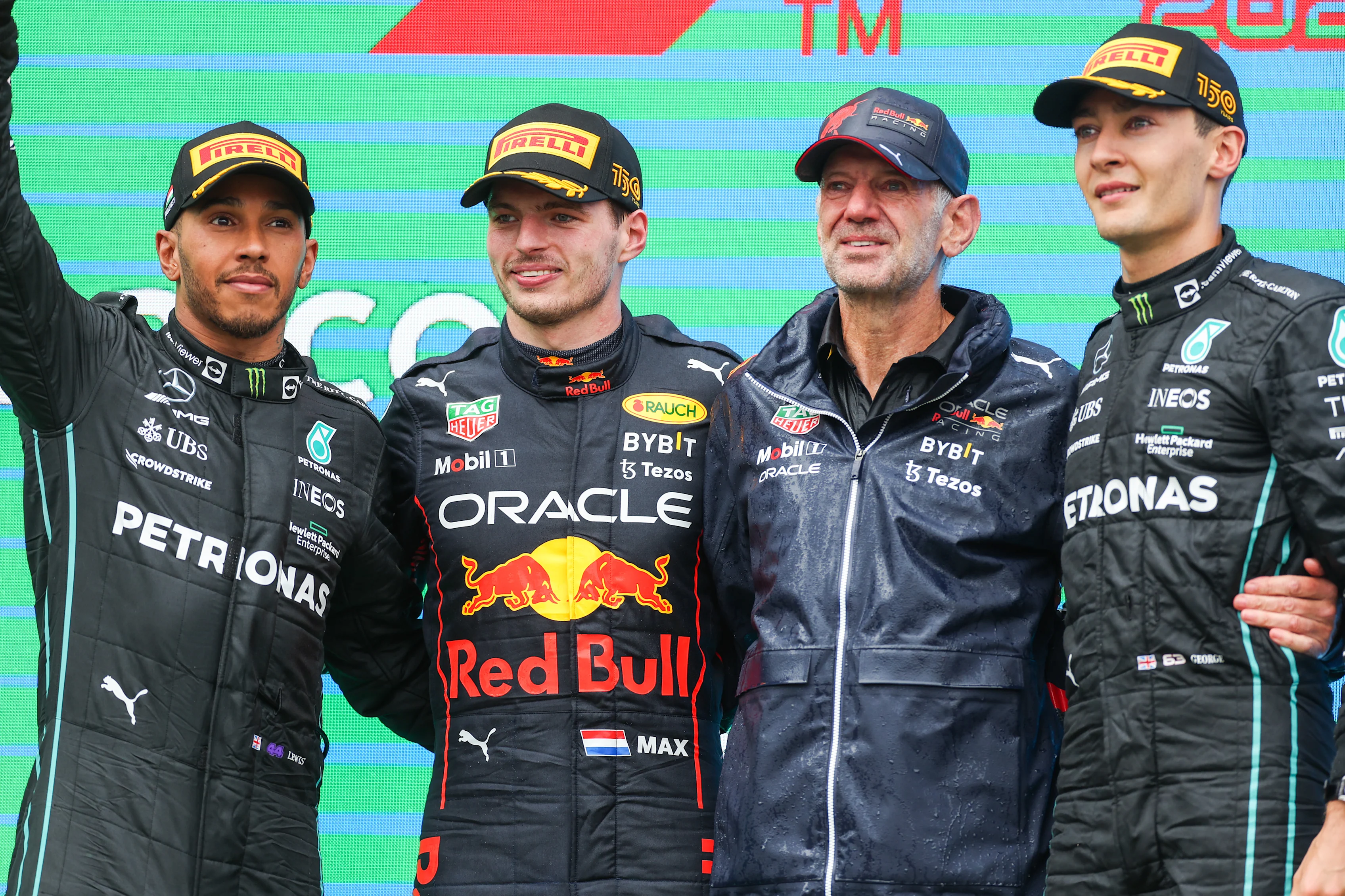BUDAPEST, HUNGARY - JULY 31: Lewis Hamilton of Mercedes and Great Britain, Max Verstappen of Red