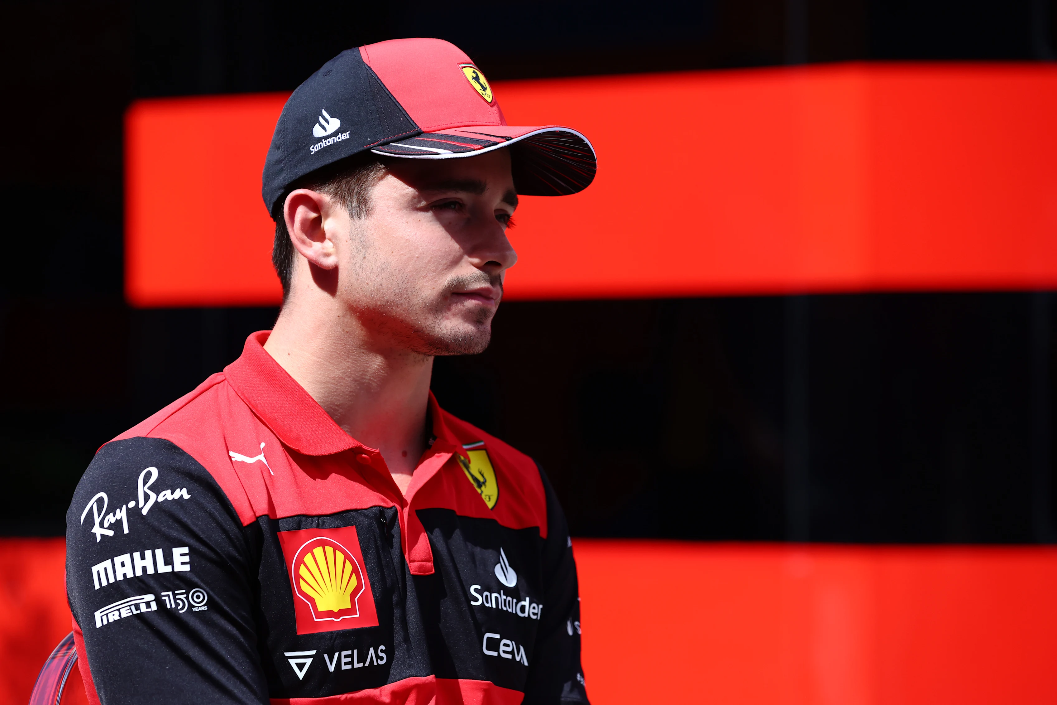 BUDAPEST, HUNGARY - JULY 28: Charles Leclerc of Monaco and Ferrari walks in the Paddock during
