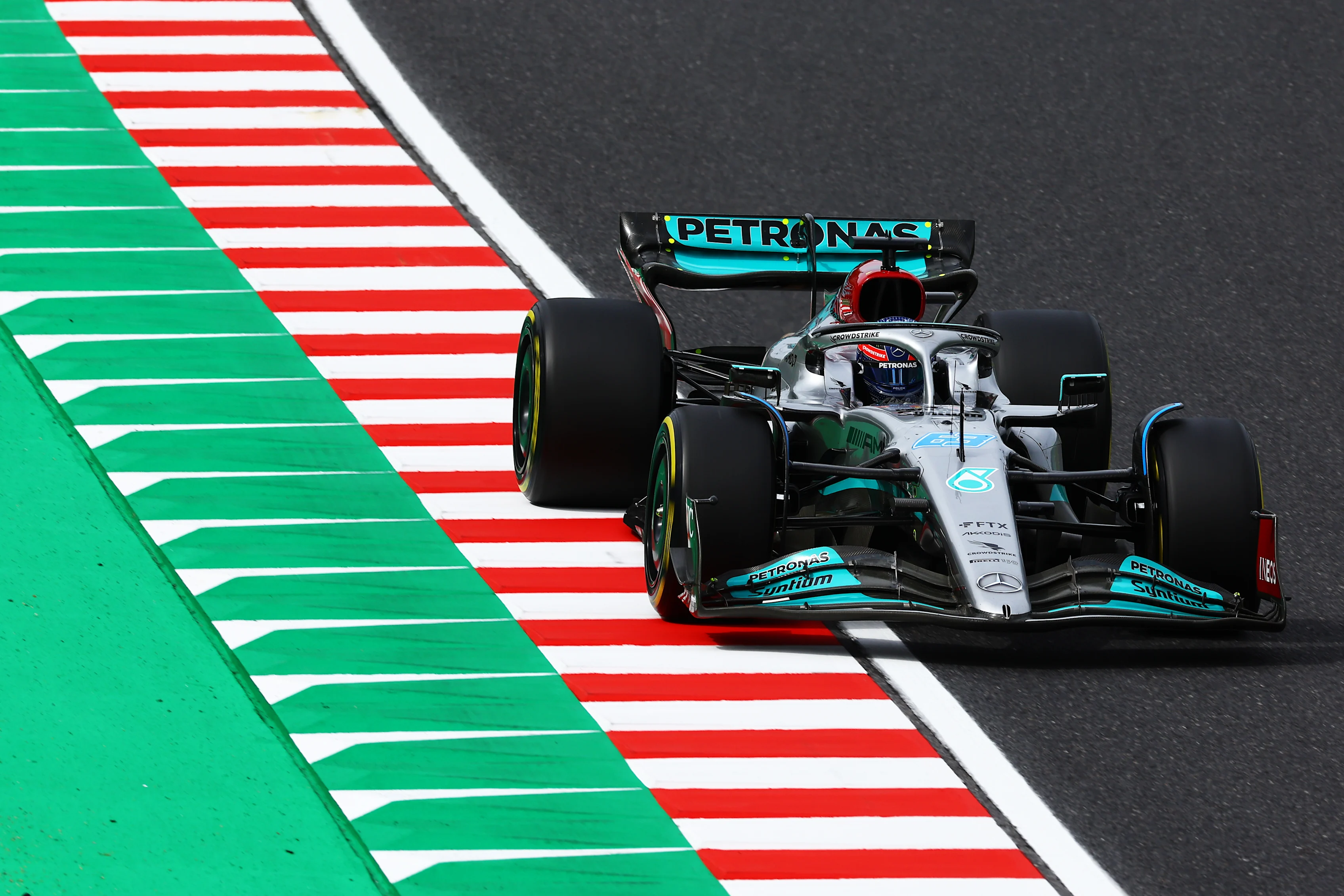 SUZUKA, JAPAN - OCTOBER 08: George Russell of Great Britain driving the (63) Mercedes AMG Petronas