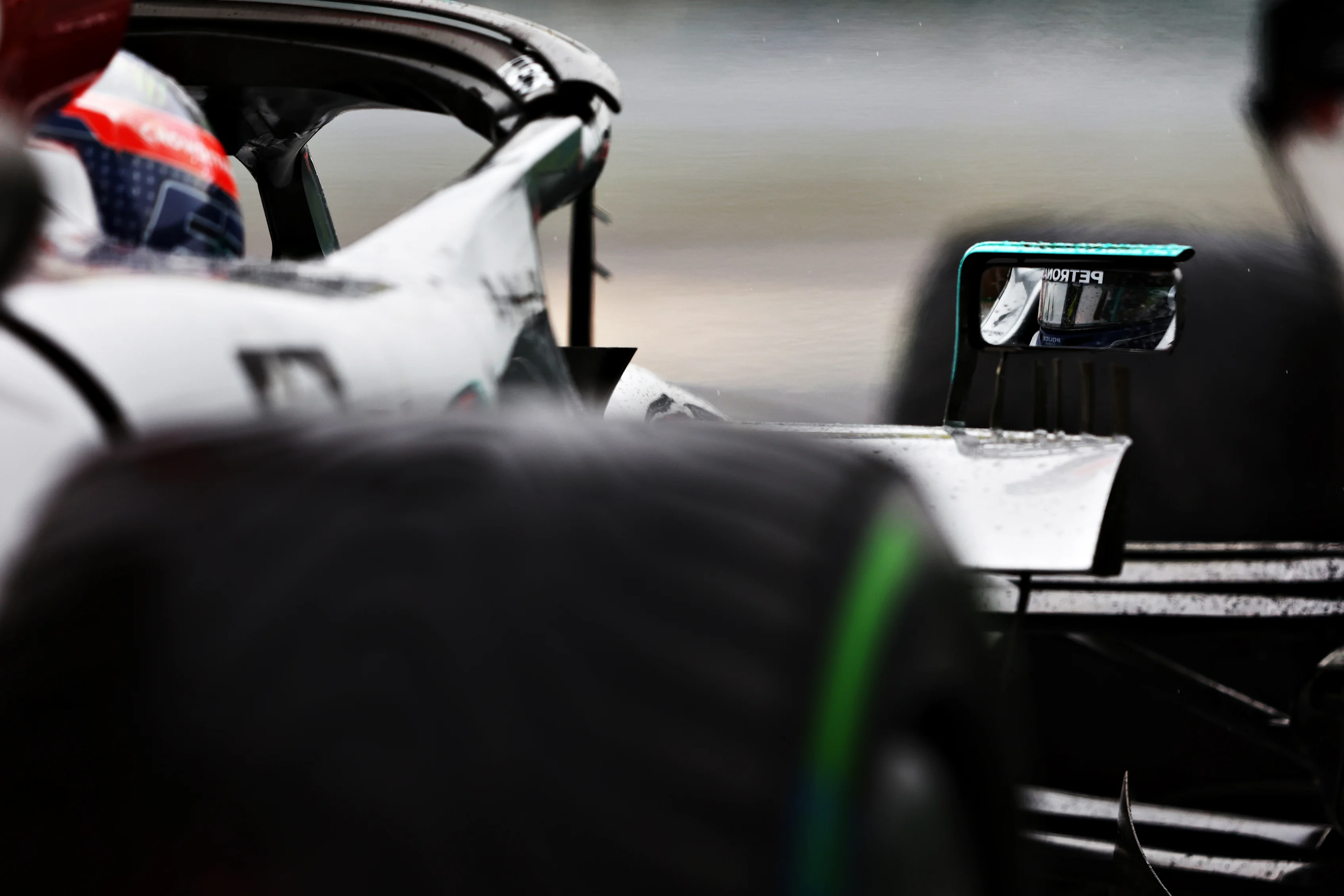 SUZUKA, JAPAN - OCTOBER 09: A view of George Russell of Great Britain and Mercedes waiting in the