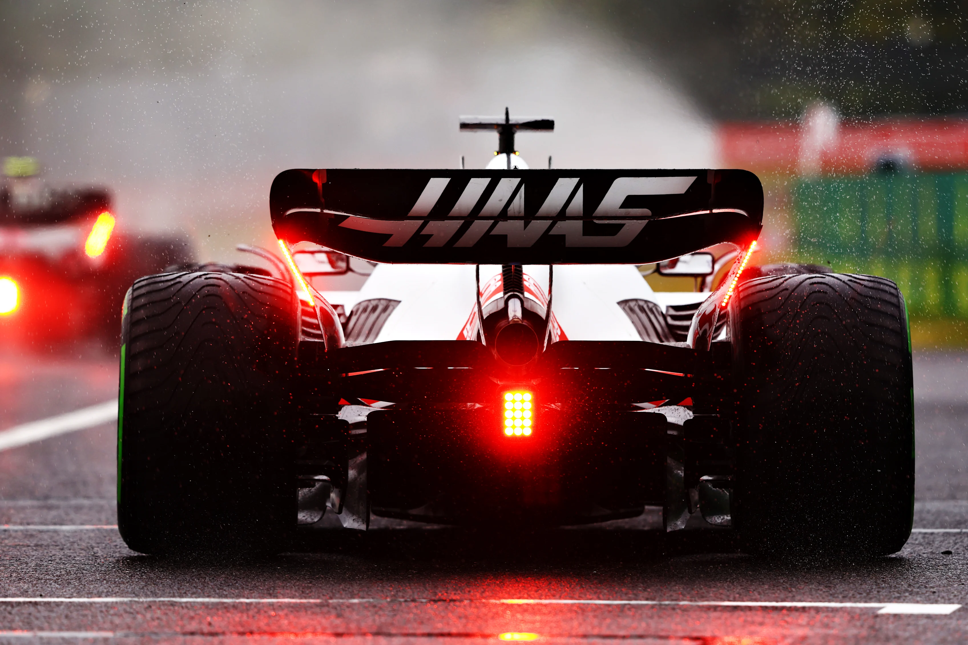 SUZUKA, JAPAN - OCTOBER 09: Kevin Magnussen of Denmark driving the (20) Haas F1 VF-22 Ferrari leaves the pitlane prior to the F1 Grand Prix of Japan at Suzuka International Racing Course on October 09, 2022 in Suzuka, Japan. (Photo by Mark Thompson/Getty Images )