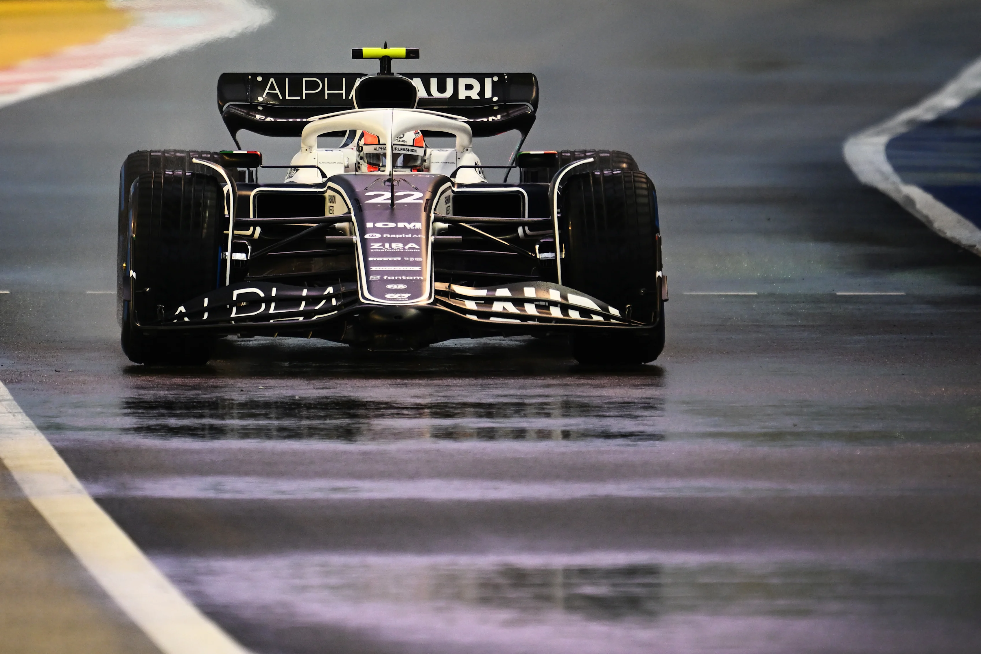 SINGAPORE, SINGAPORE - OCTOBER 01: Yuki Tsunoda of Japan driving the (22) Scuderia AlphaTauri AT03 during final practice ahead of the F1 Grand Prix of Singapore at Marina Bay Street Circuit on October 01, 2022 in Singapore, Singapore. (Photo by Clive Mason/Getty Images)