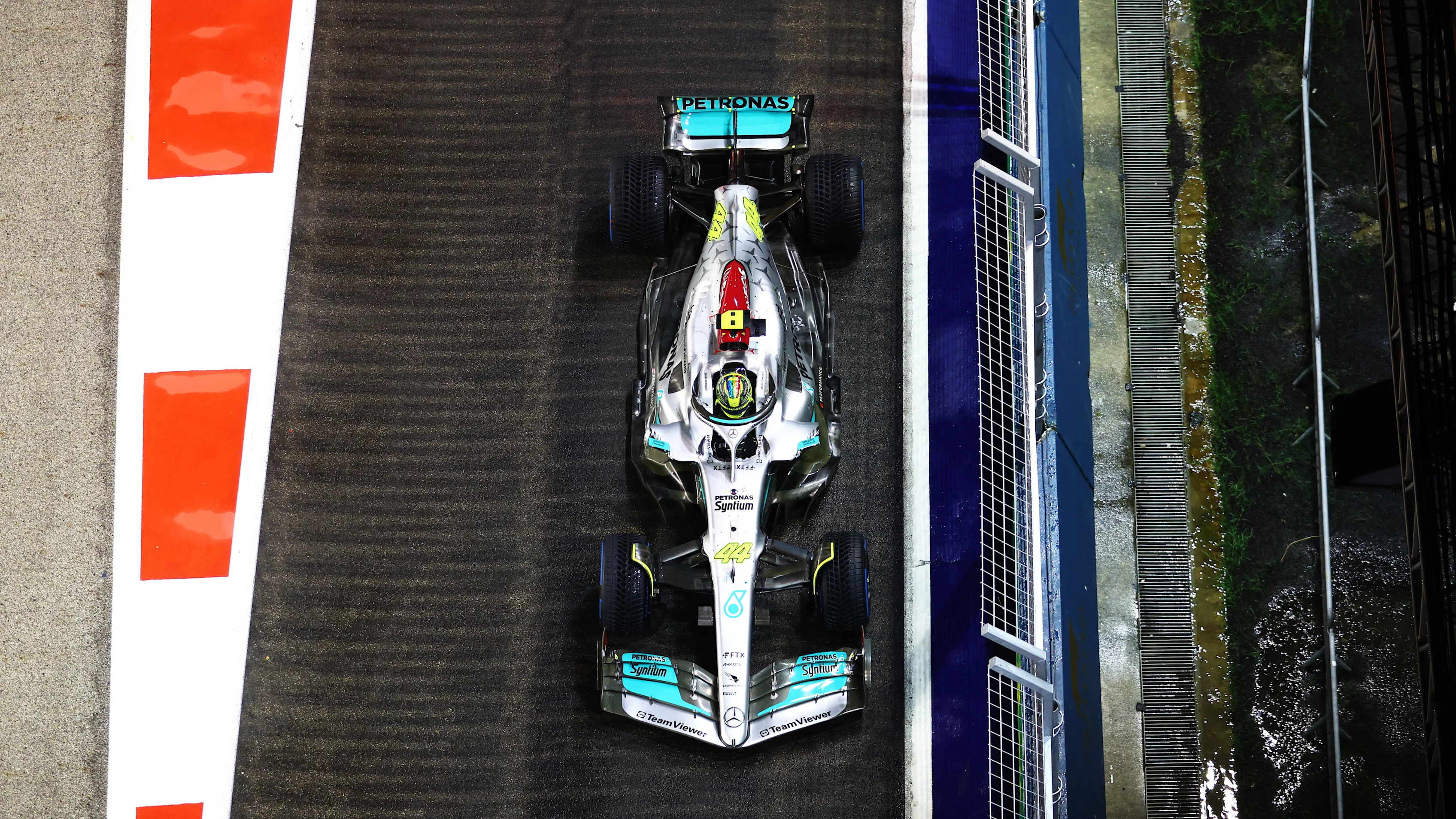 SINGAPORE, SINGAPORE - OCTOBER 02: Lewis Hamilton of Great Britain driving the (44) Mercedes AMG