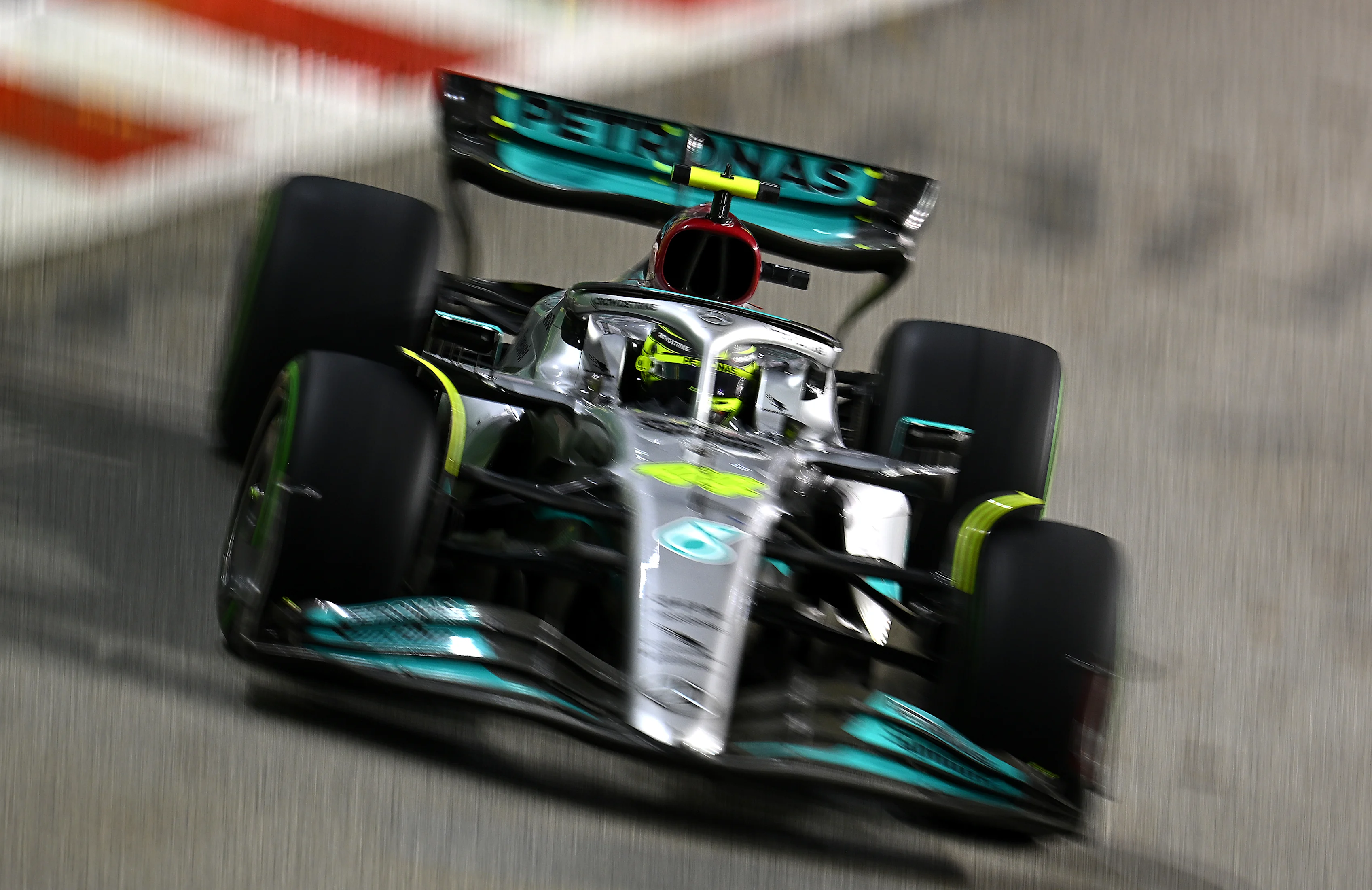 SINGAPORE, SINGAPORE - OCTOBER 02: Lewis Hamilton of Great Britain driving the (44) Mercedes AMG
