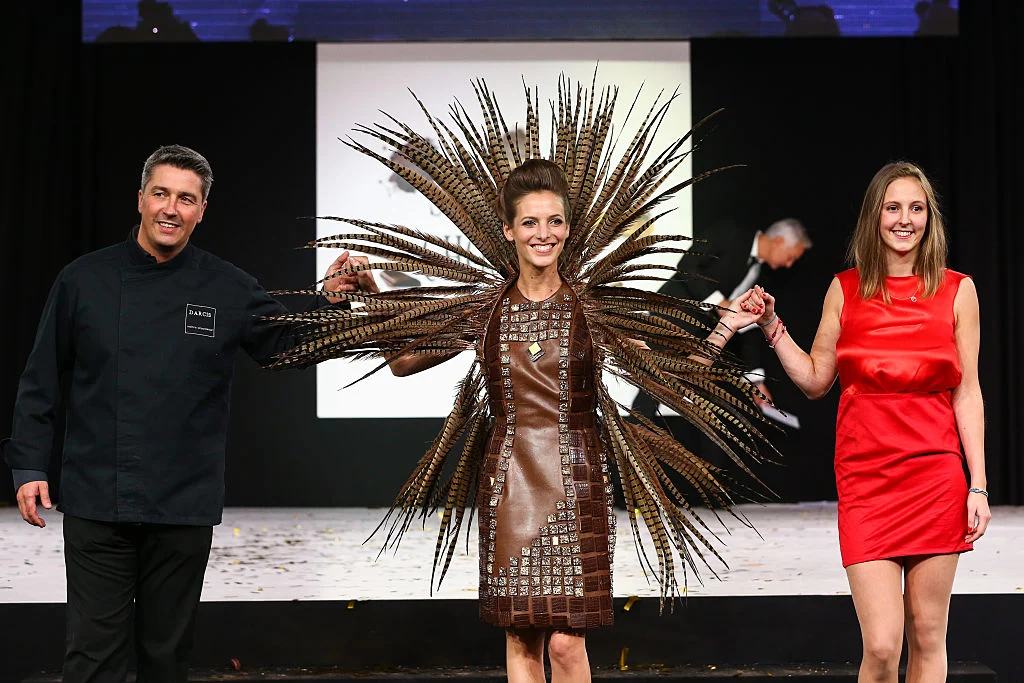 PARIS, FRANCE - OCTOBER 28: (L-R) Chocolate makers Jean-Philippe Darcis, actress Elodie Varlet and