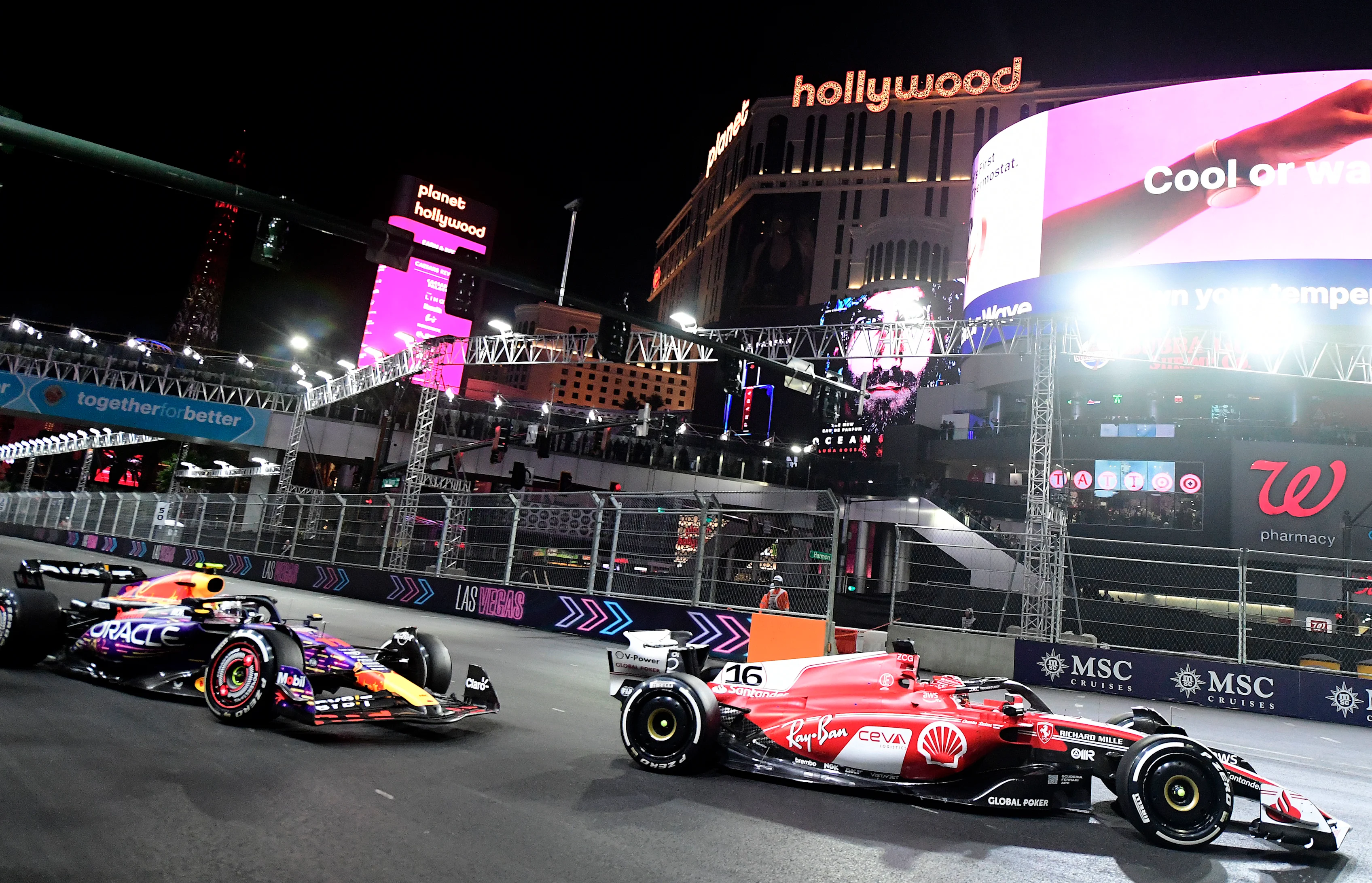 Las Vegas, NV - November 18: Charles Leclerc, right, leads Sergio Perez, left, as they make the