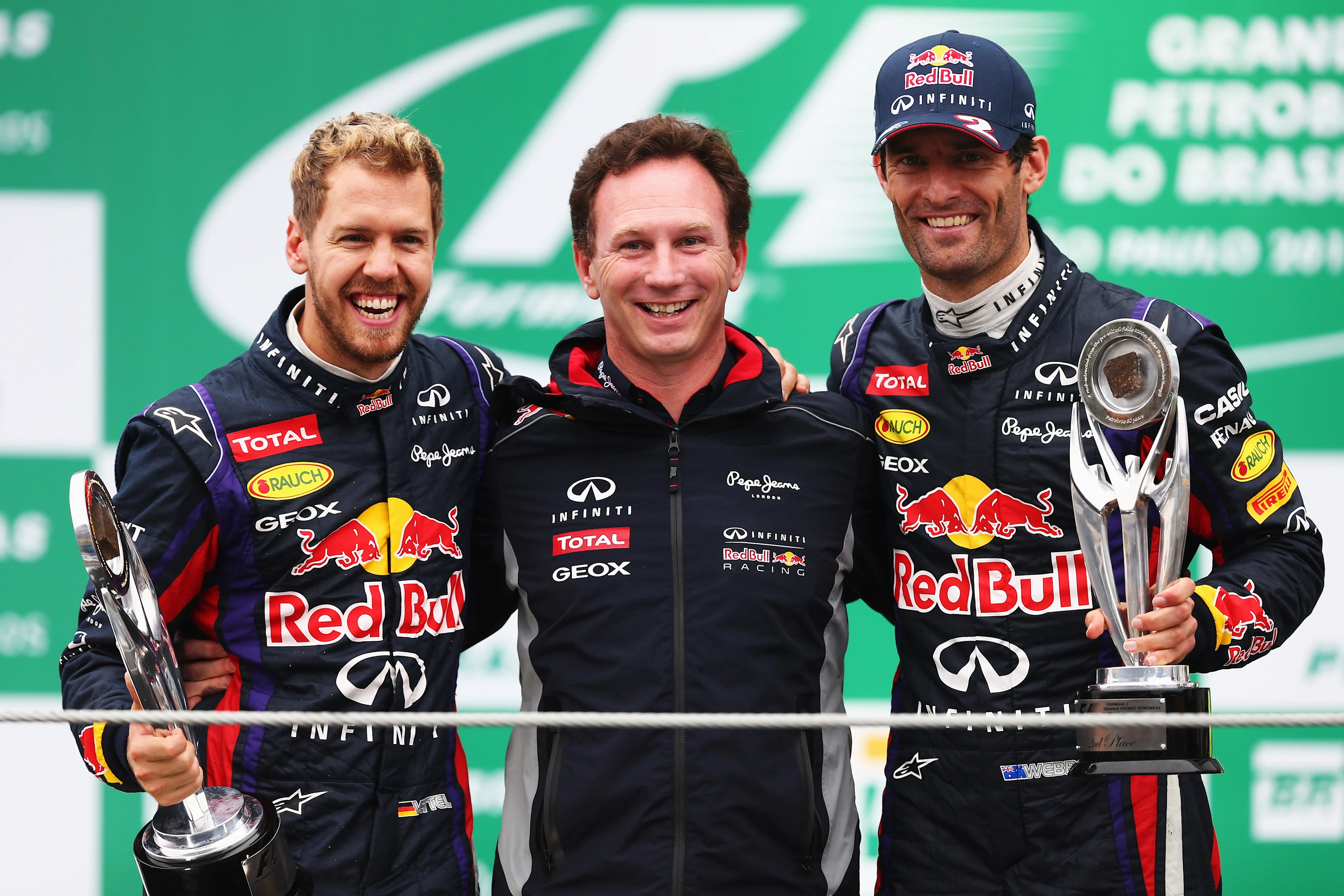 SAO PAULO, BRAZIL - NOVEMBER 24: Race winner Sebastian Vettel (L) of Germany and Infiniti Red Bull
