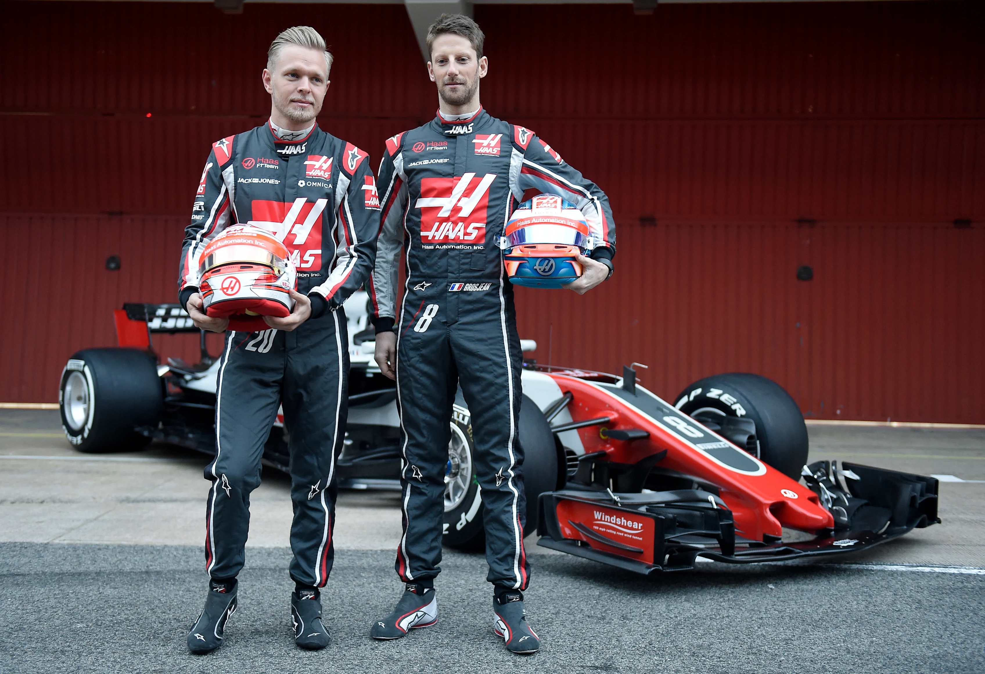 HAAS F1 Team's French driver Romain Grosjean (R) and HAAS F1 Team's Danish driver Kevin Magnussen