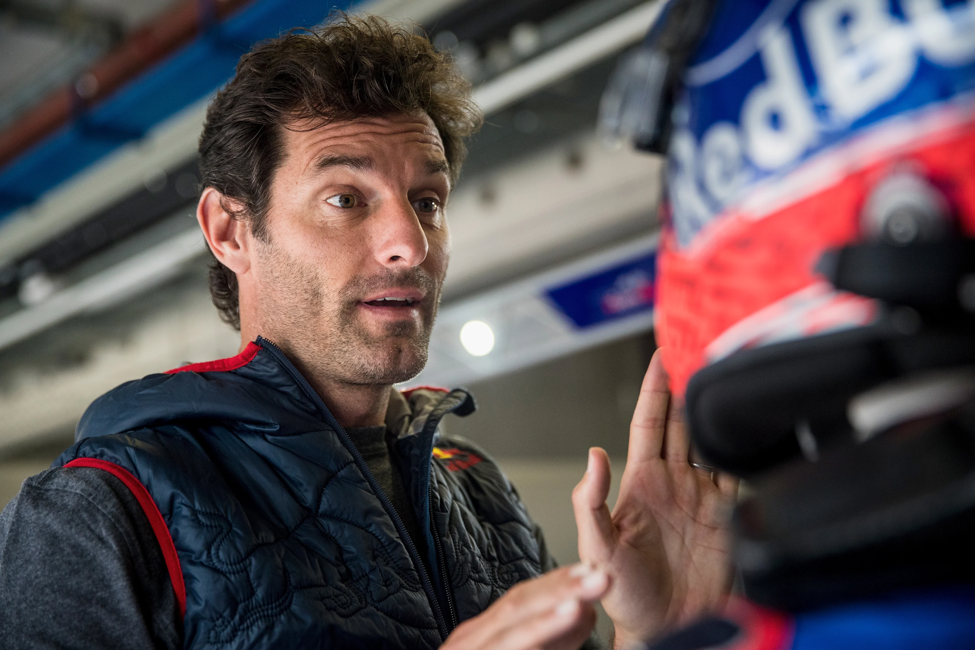 SPIELBERG, AUSTRIA - JUNE 05: Mark Webber of Australia (L) gives instructions to Marc Marquez of