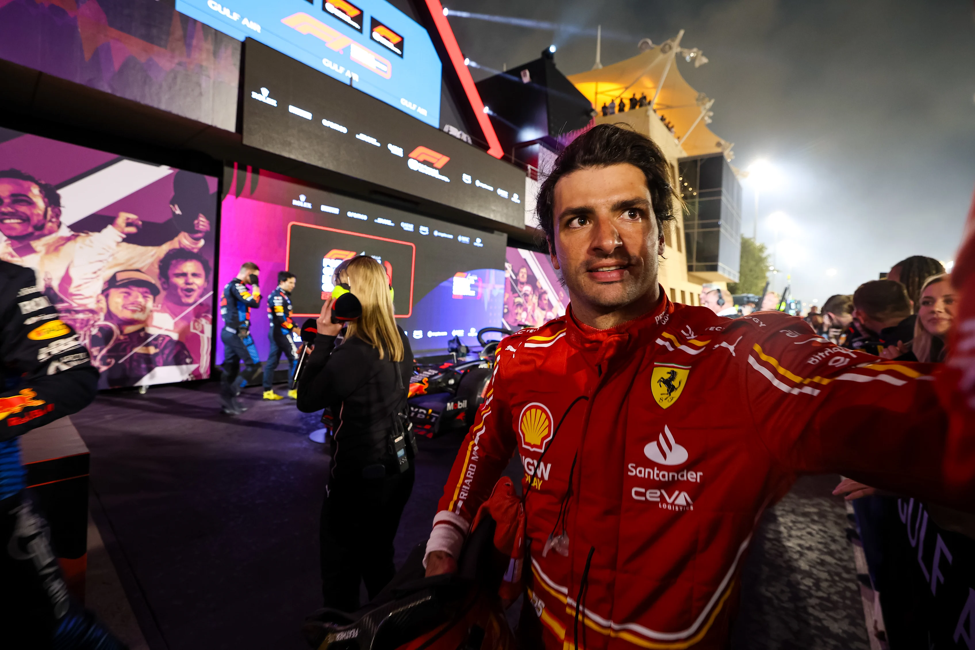 BAHRAIN, BAHRAIN - MARCH 2: Carlos Sainz of Spain and Scuderia Ferrari in parc ferme prior to the