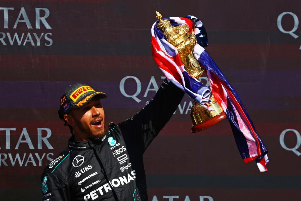 NORTHAMPTON, ENGLAND - JULY 07: Race winner Lewis Hamilton of Great Britain and Mercedes celebrates