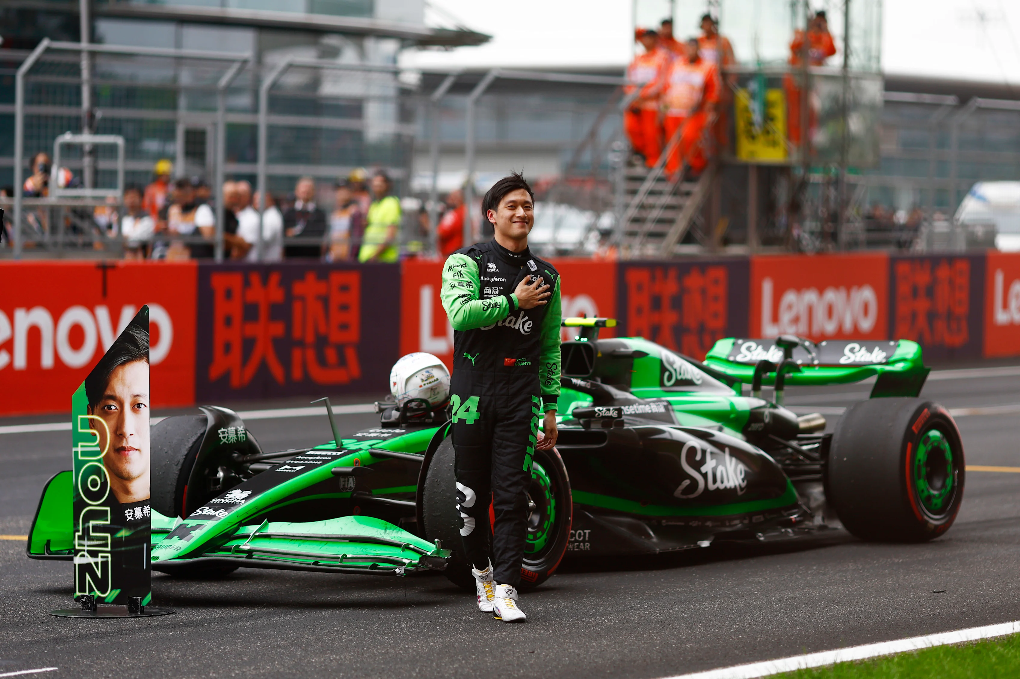 Zhou Guanyu, Stake F1 Team Kick Sauber, acknowledges his home fans from the grid after the race;