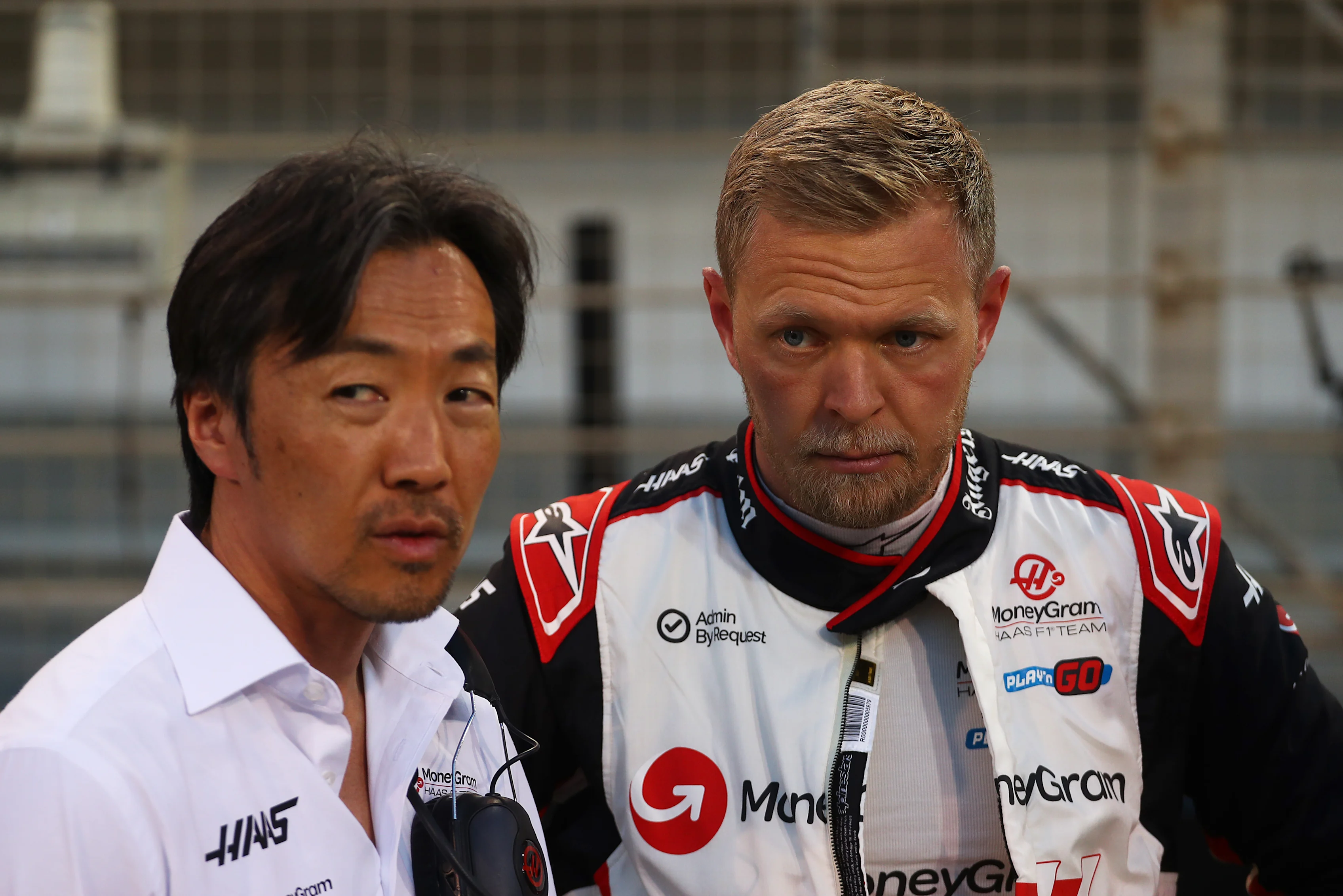 BAHRAIN, BAHRAIN - MARCH 02: Kevin Magnussen of Denmark and Haas F1 and Haas F1 Team Principal Ayao
