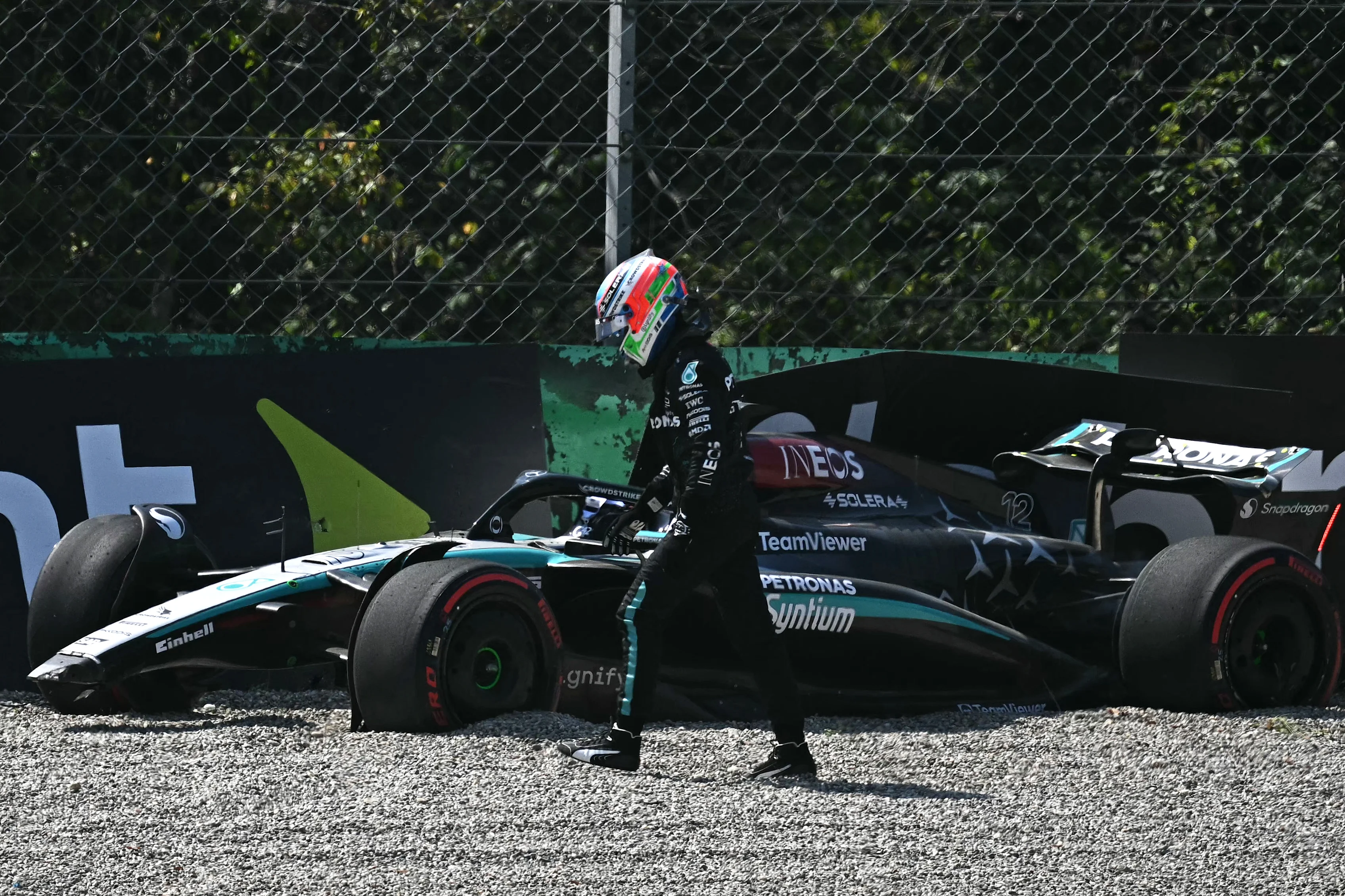 Mercedes' Italian driver Andrea Kimi Antonelli leaves his car after crashing during first practice