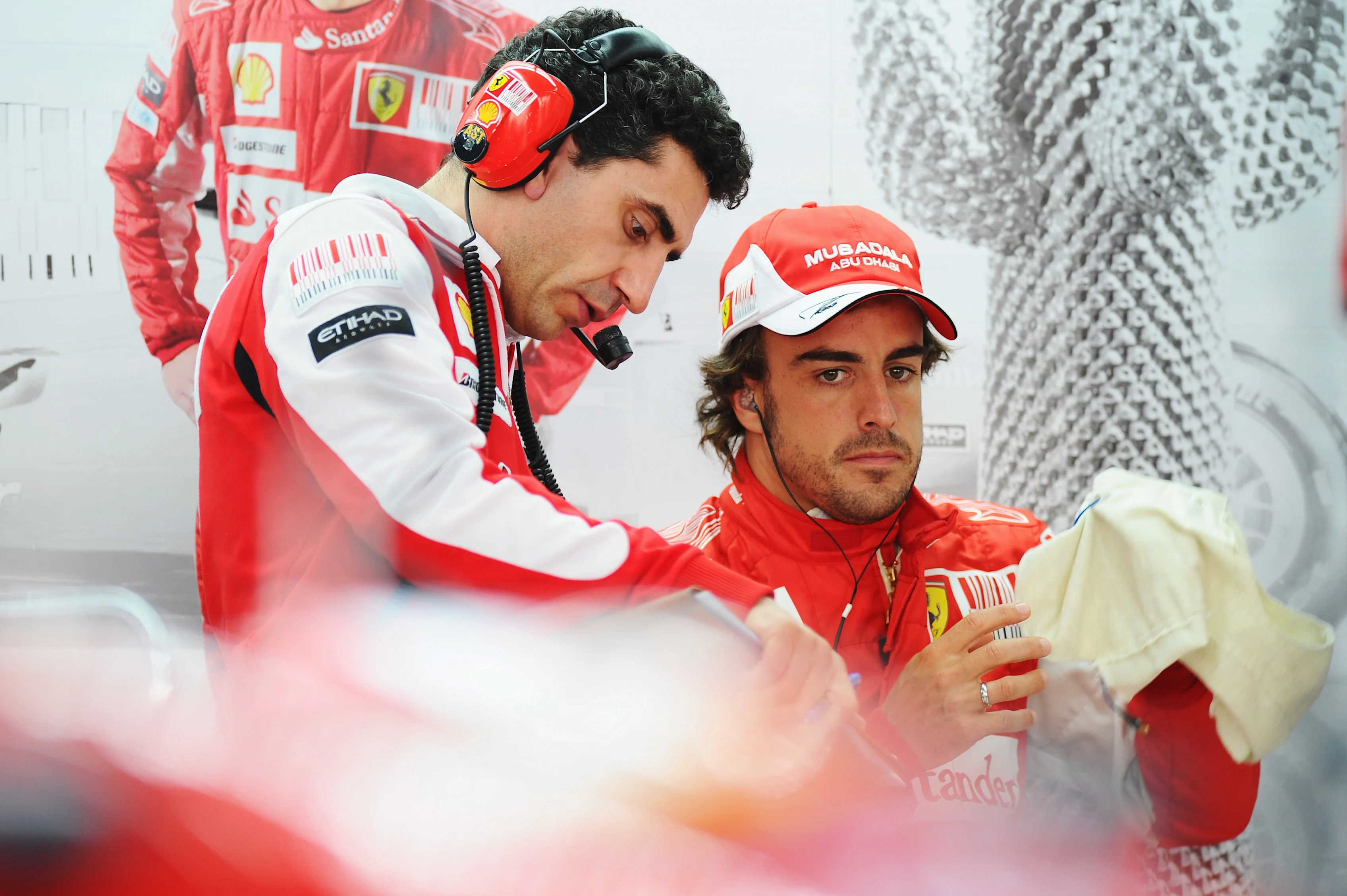 YEONGAM GUN, SOUTH KOREA - OCTOBER 22: Fernando Alonso of Spain and Ferrari talks with his race