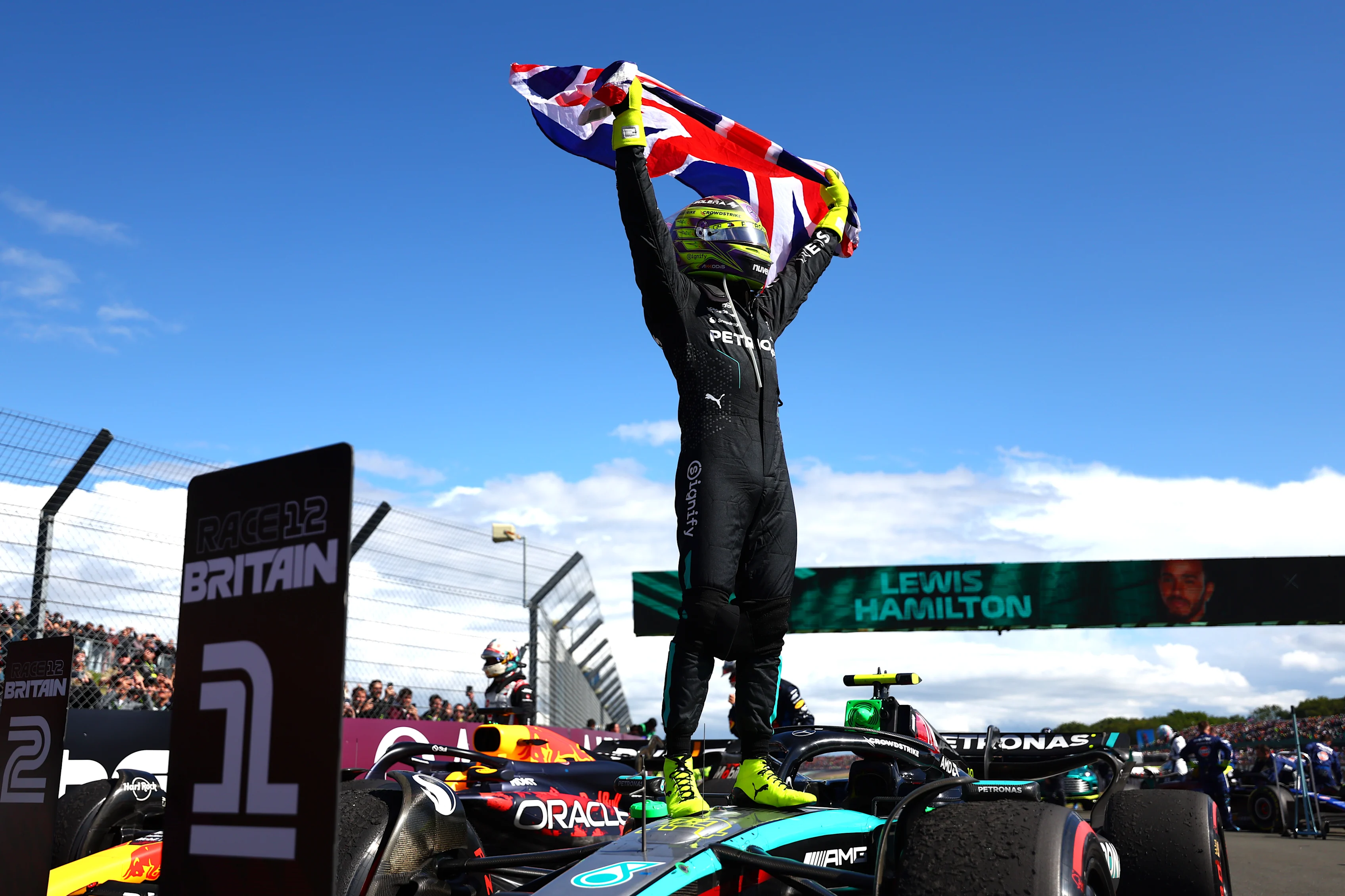 NORTHAMPTON, ENGLAND - JULY 07: Race winner Lewis Hamilton of Great Britain and Mercedes celebrates