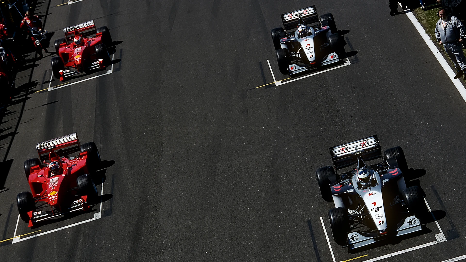 A dramatic start at Silverstone blew the title race wide open, with Schumacher breaking his leg in a crash