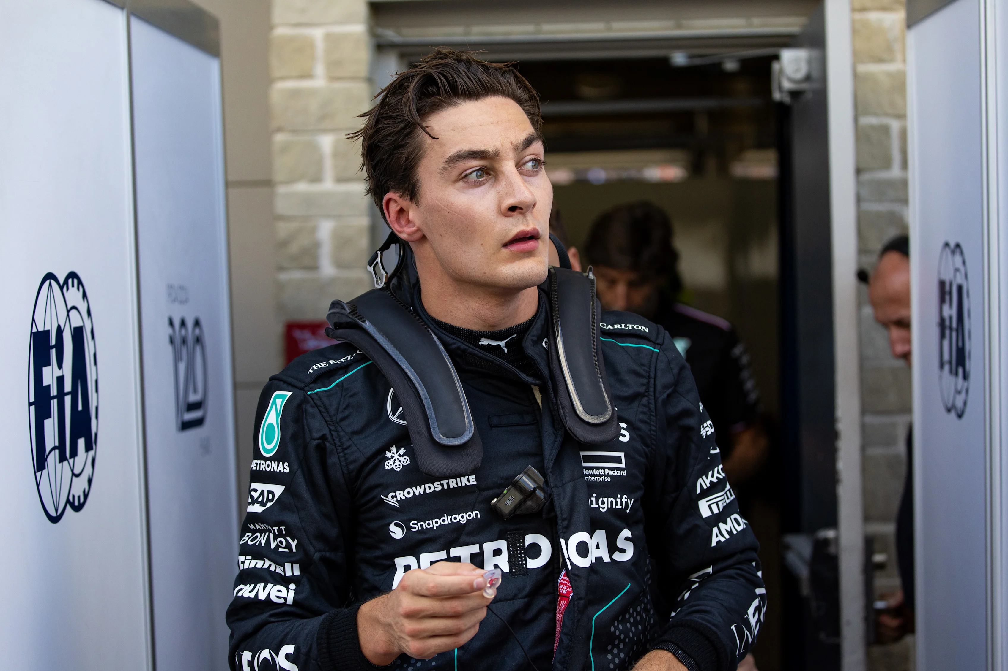 AUSTIN, TEXAS - OCTOBER 19: George Russell of Great Britain and Mercedes exits the FIA garage