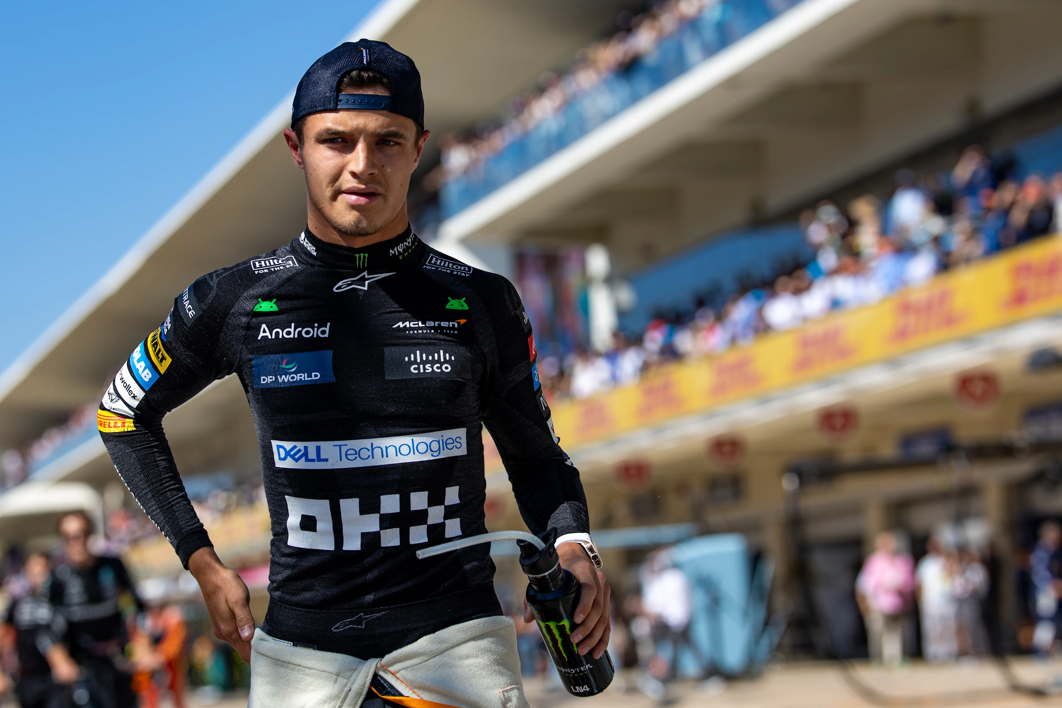 AUSTIN, TEXAS - OCTOBER 20: Lando Norris of Great Britain and McLaren walks to the grid during the F1 Grand Prix of United States at Circuit of The Americas on October 20, 2024 in Austin, United States. (Photo by Kym Illman/Getty Images)