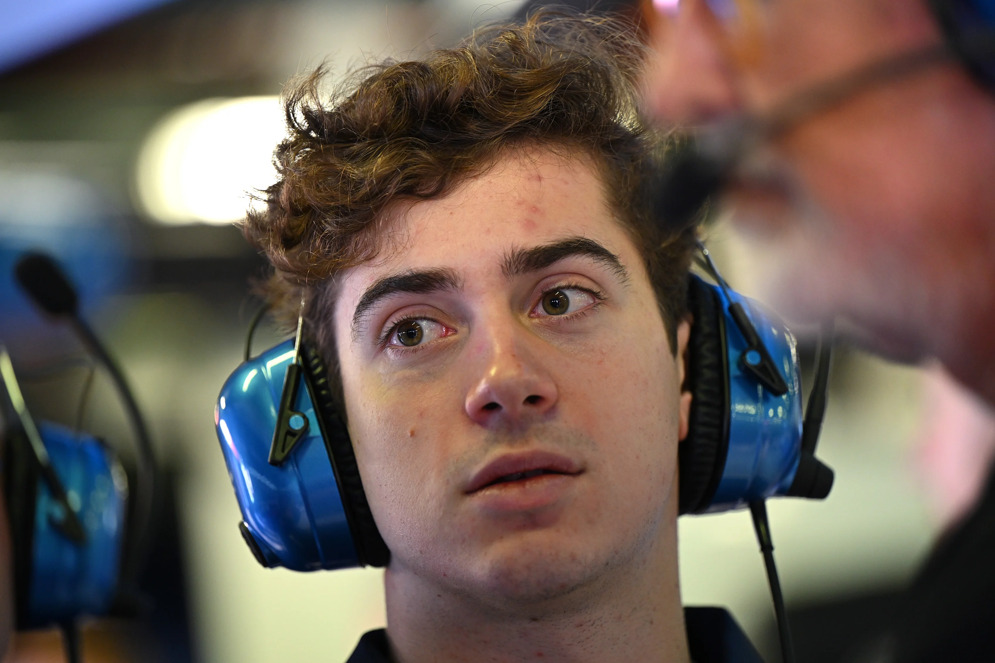 MELBOURNE, AUSTRALIA - MARCH 14: Franco Colapinto, Reserve Driver, Alpine F1 looks on in the garage