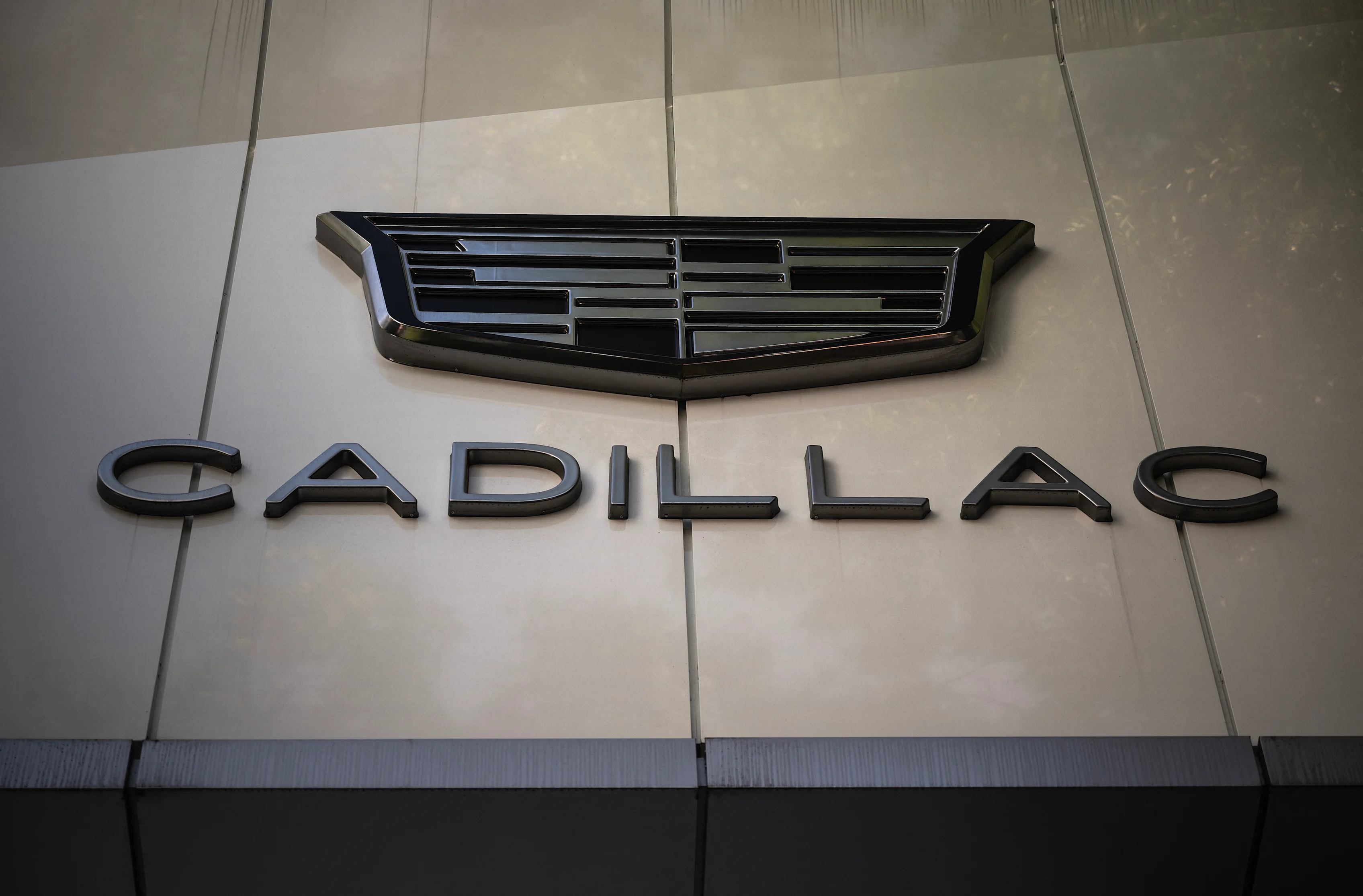 View of the Cadillac logo at a Cadillac car showroom in Mexico City on December 5, 2024. Sales of