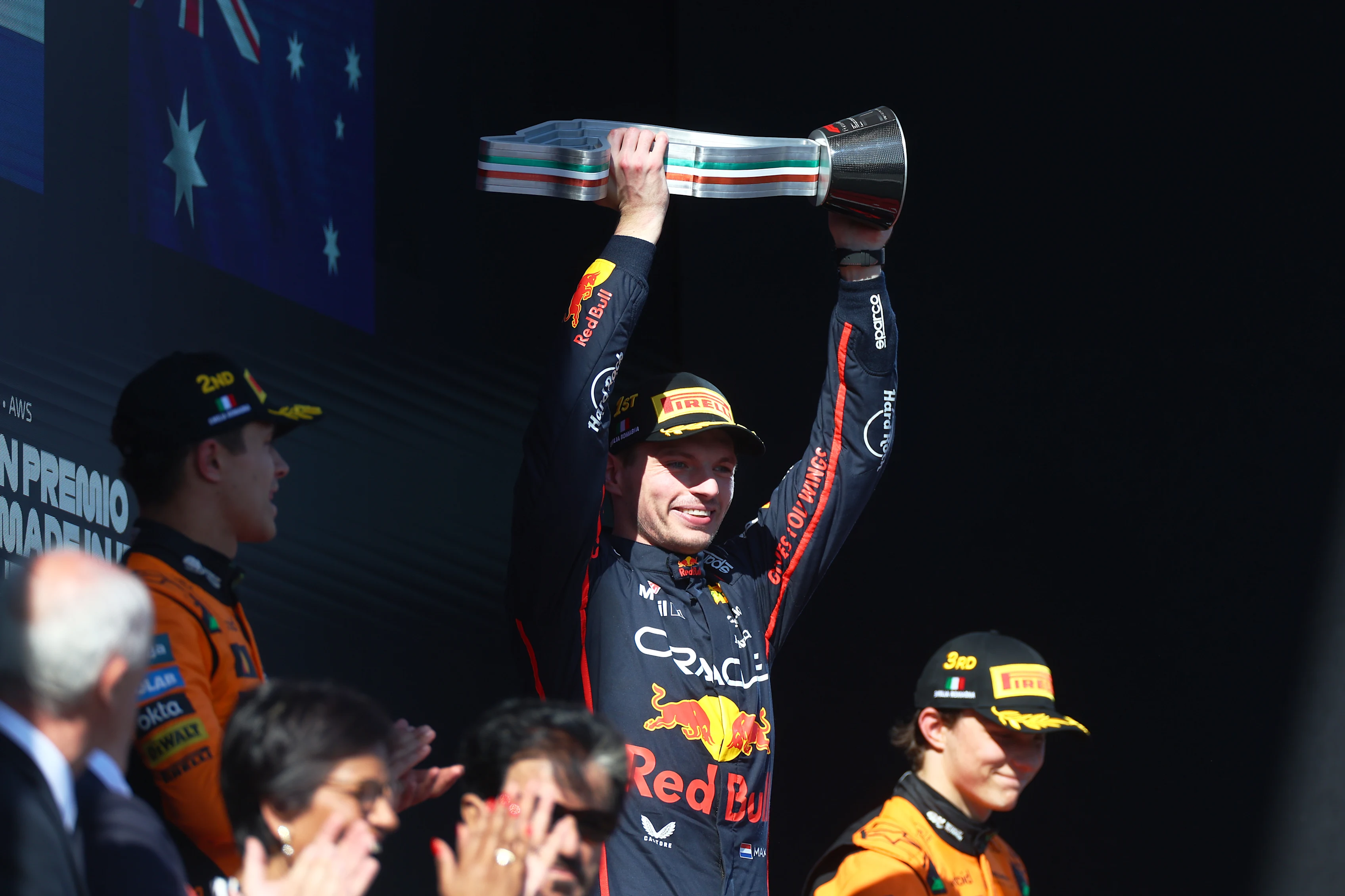 IMOLA, ITALY - MAY 18: Race winner Max Verstappen of the Netherlands and Oracle Red Bull Racing lifts the winners trophy on the podium during the F1 Grand Prix of Emilia-Romagna at Autodromo Internazionale Enzo e Dino Ferrari on May 18, 2025 in Imola, Italy. (Photo by Peter Fox/LAT Images)